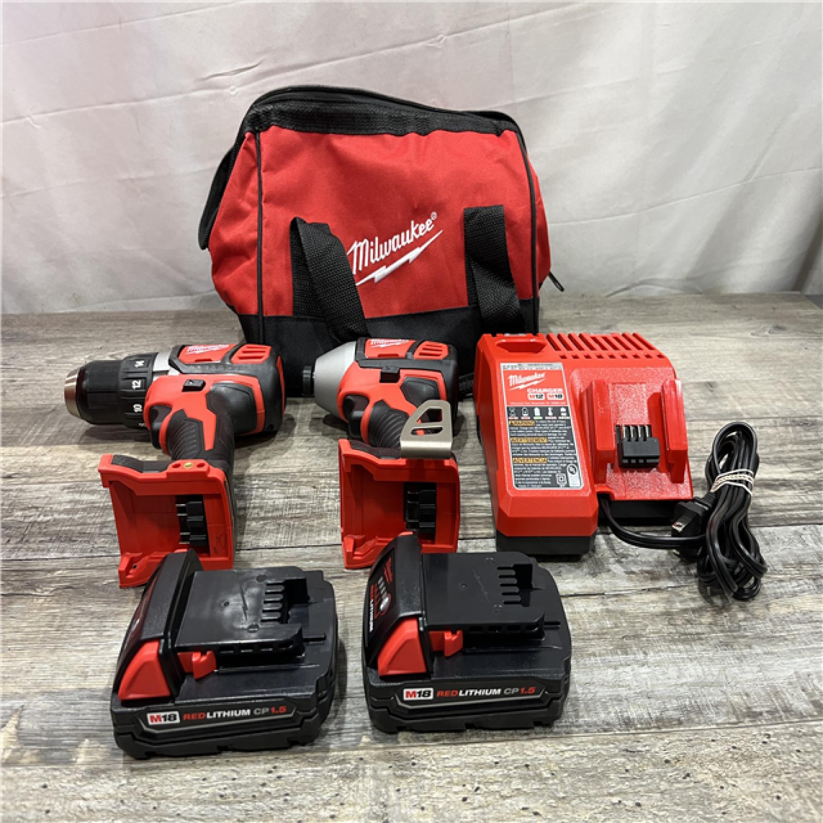 AS-IS Milwaukee 18V Lithium-Ion Cordless Drill Driver/Impact Driver Combo Kit