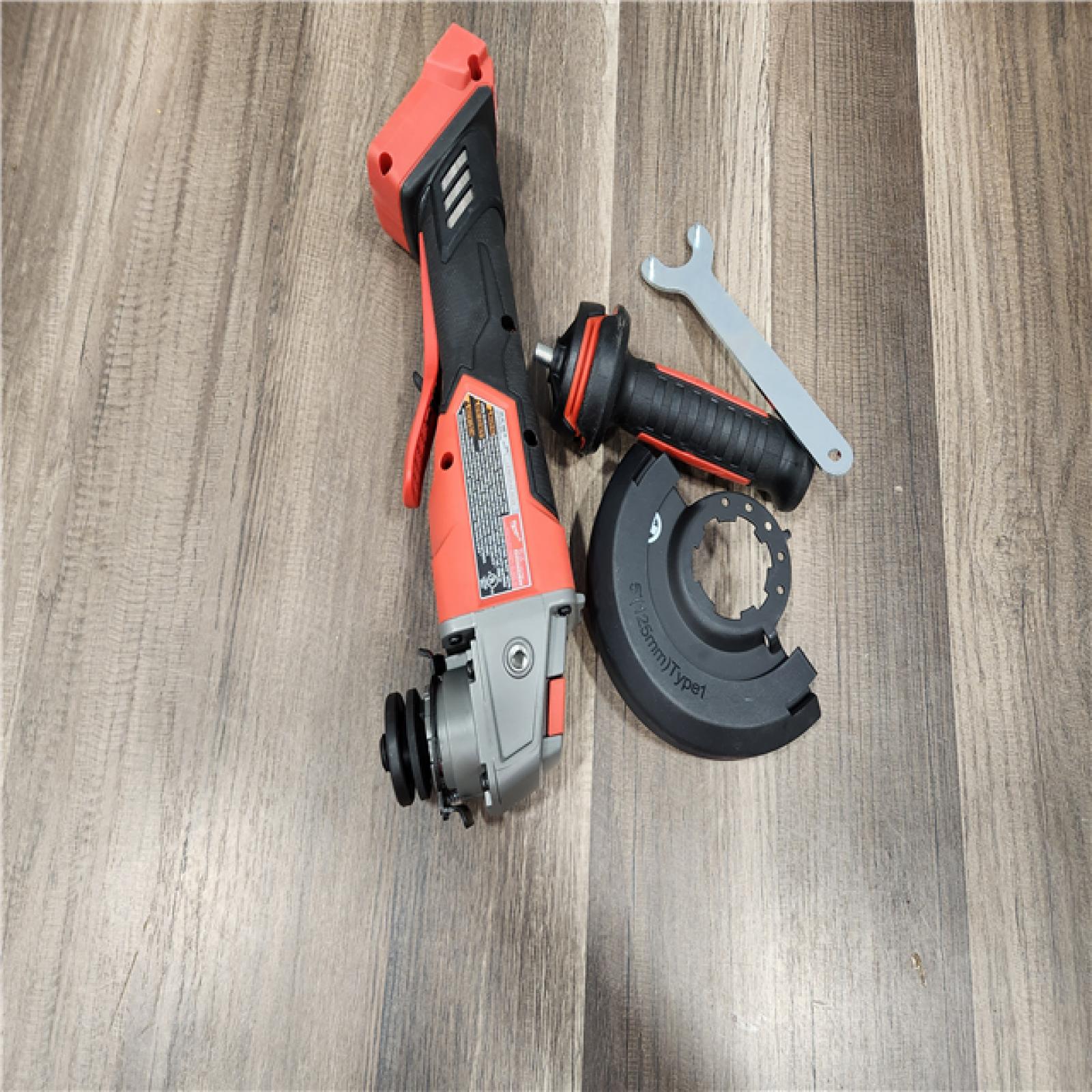 AS-IS Milwaukee M18 FUEL 18V Lithium-Ion Brushless Cordless 4-1/2 in./5 in. Grinder w/Paddle Switch (Tool-Only)