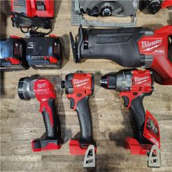 HOUSTON LOCATION - AS-IS (APPEARS LIKE NEW) Milwaukee M18 FUEL 18V Lithium-Ion Brushless Cordless Combo Kit with Two 5.0 Ah Batteries  1 Charger  2 Tool Bags (7-Tool)