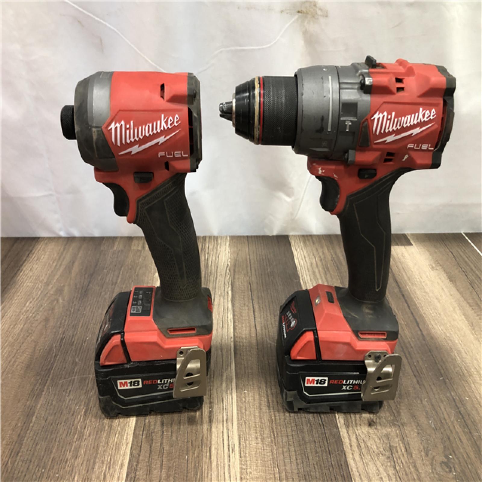 AS-IS Milwaukee FUEL 18V Lithium-Ion Brushless Cordless Hammer Drill and Impact Driver Combo Kit