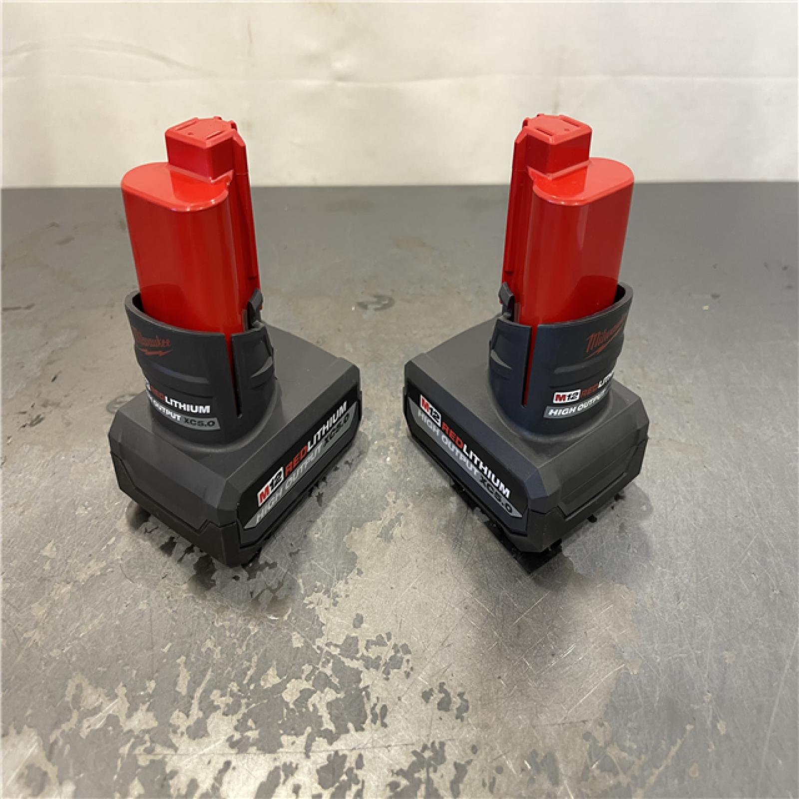 AS-IS - Milwaukee M12 12V Lithium-Ion XC High Output 5.0 Ah Battery Pack (2-Pack) Starter Kit with Charger