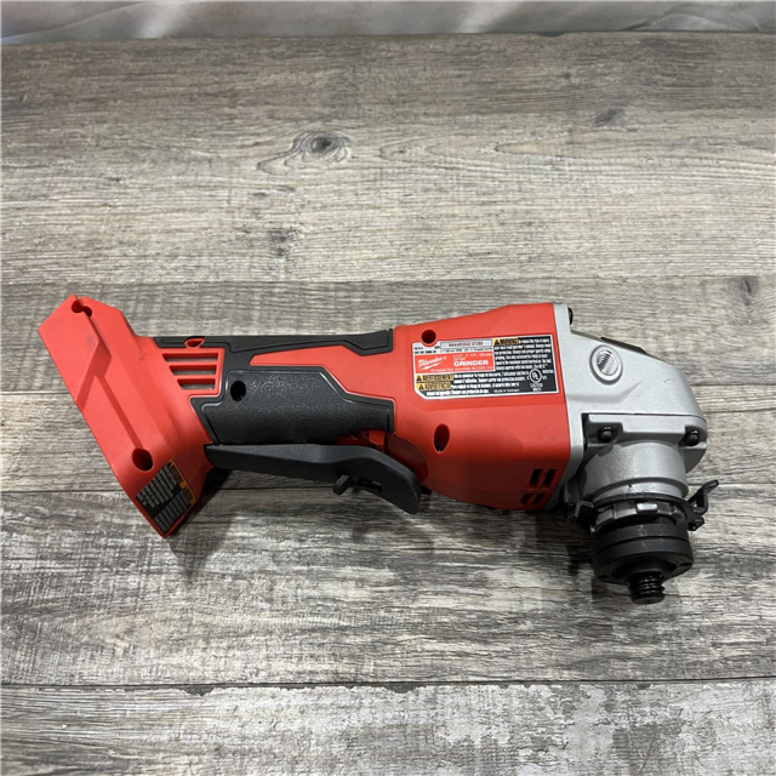 AS-IS Milwaukee 18V Lithium-Ion Brushless Cordless 4-1/2 in./5 in. Grinder w/Paddle Switch (Tool-Only)
