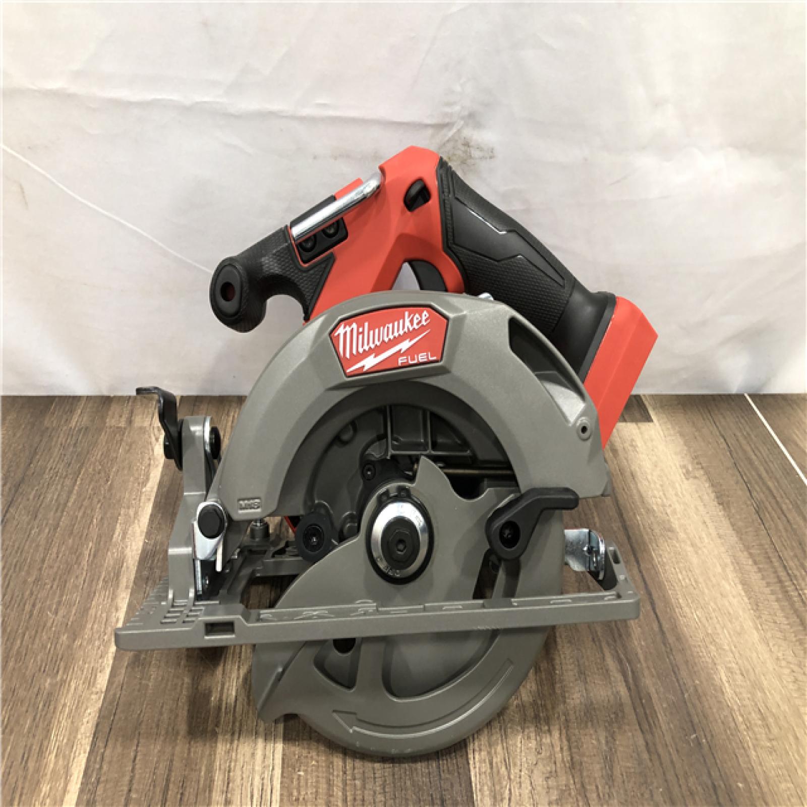 AS-IS Milwaukee FUEL 18V Lithium-Ion Brushless Cordless 6-1/2 in. Circular Saw (Tool-Only)