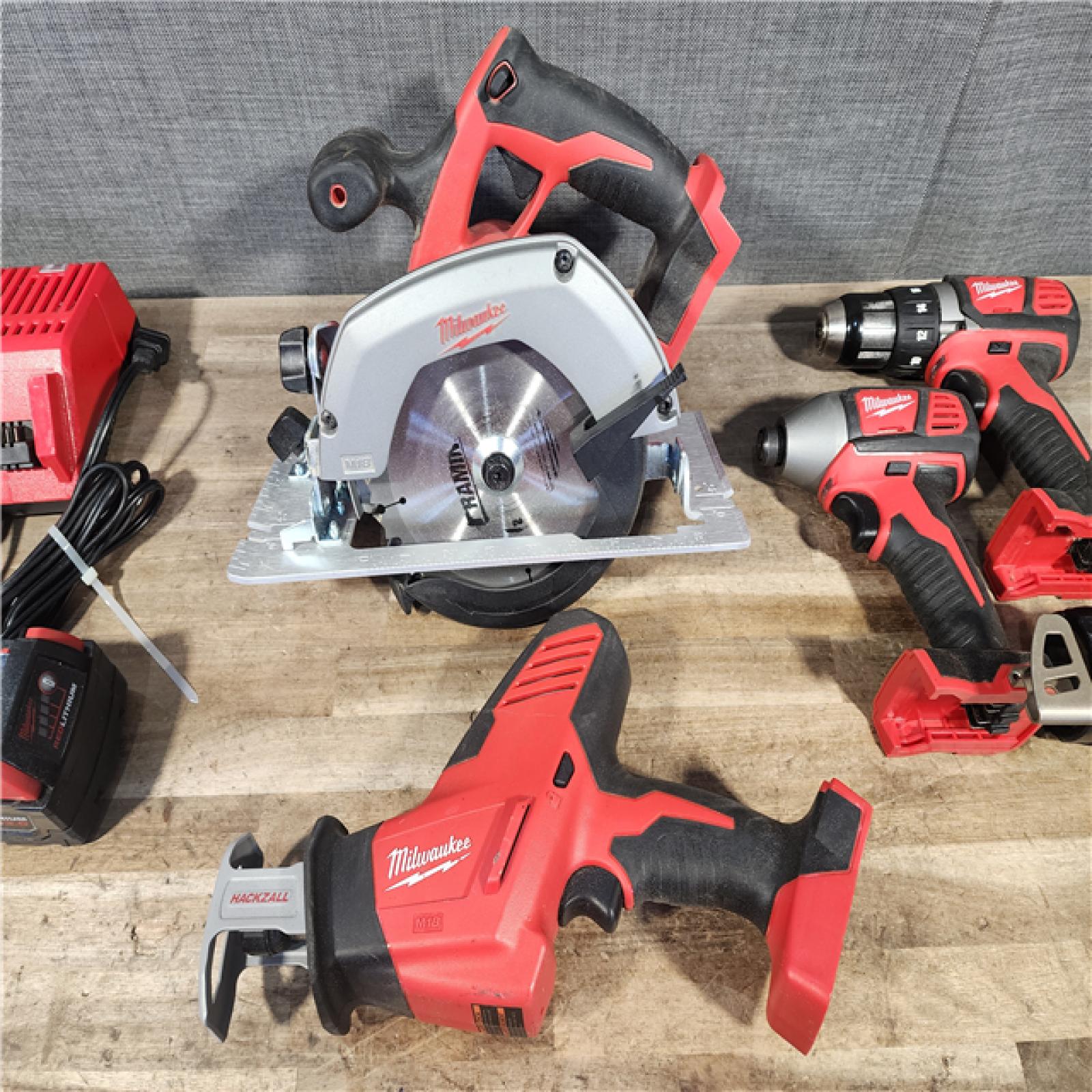 HOUSTON LOCATION - AS-IS MILWAUKEE 5 TOOL COMBO KIT W/ (2) BATTERY & CHARGER
