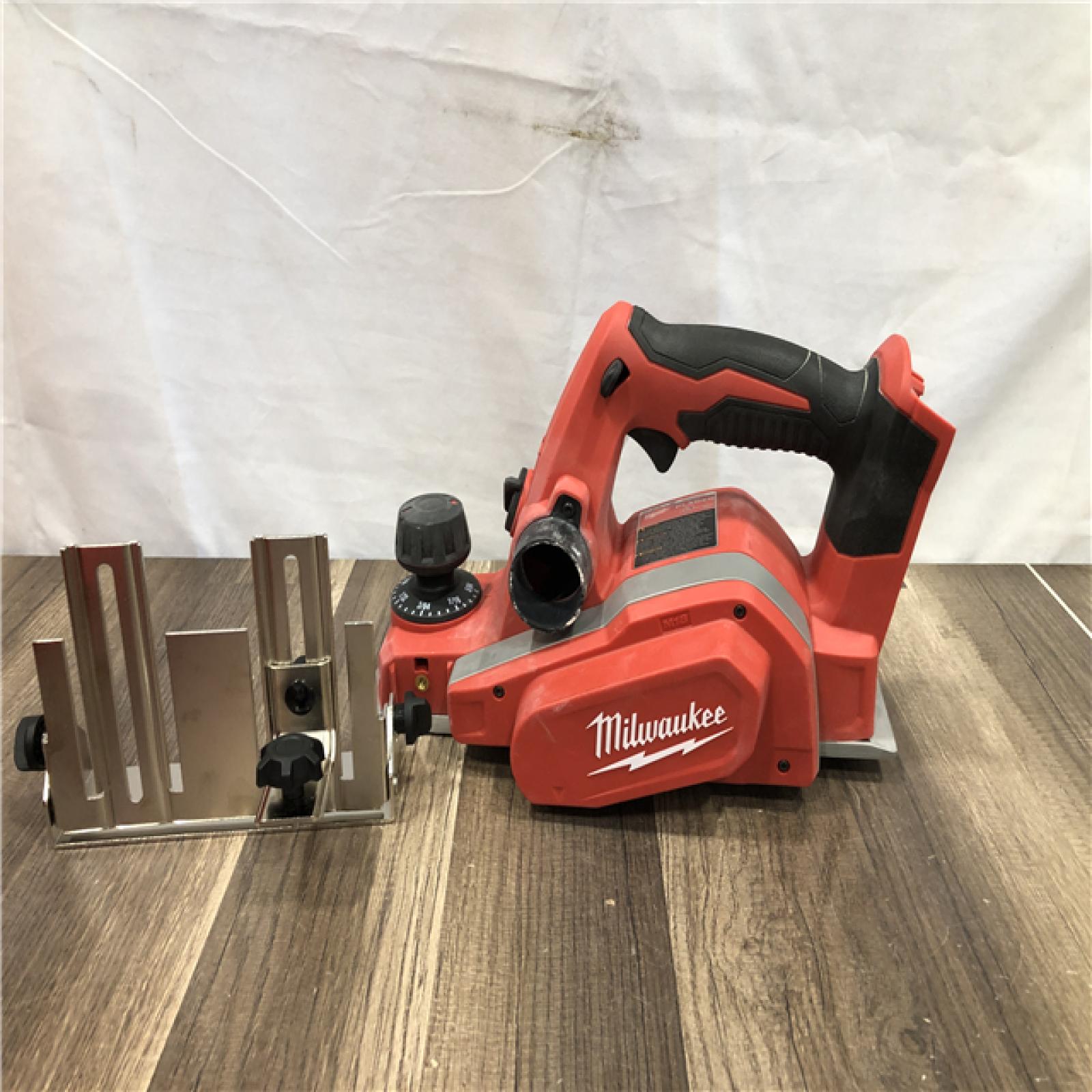 AS-IS Milwaukee 18V Lithium-Ion Cordless 3-1/4 in. Planer (Tool-Only)