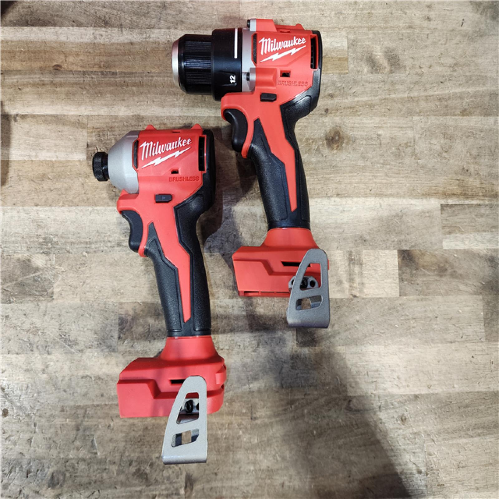 HOUSTON LOCATION - AS-IS Milwaukee M18 18V Lithium-Ion Brushless Cordless Compact Drill/Impact Combo Kit (2-Tool) W/(2) 2.0 Ah Batteries  Charger & Bag