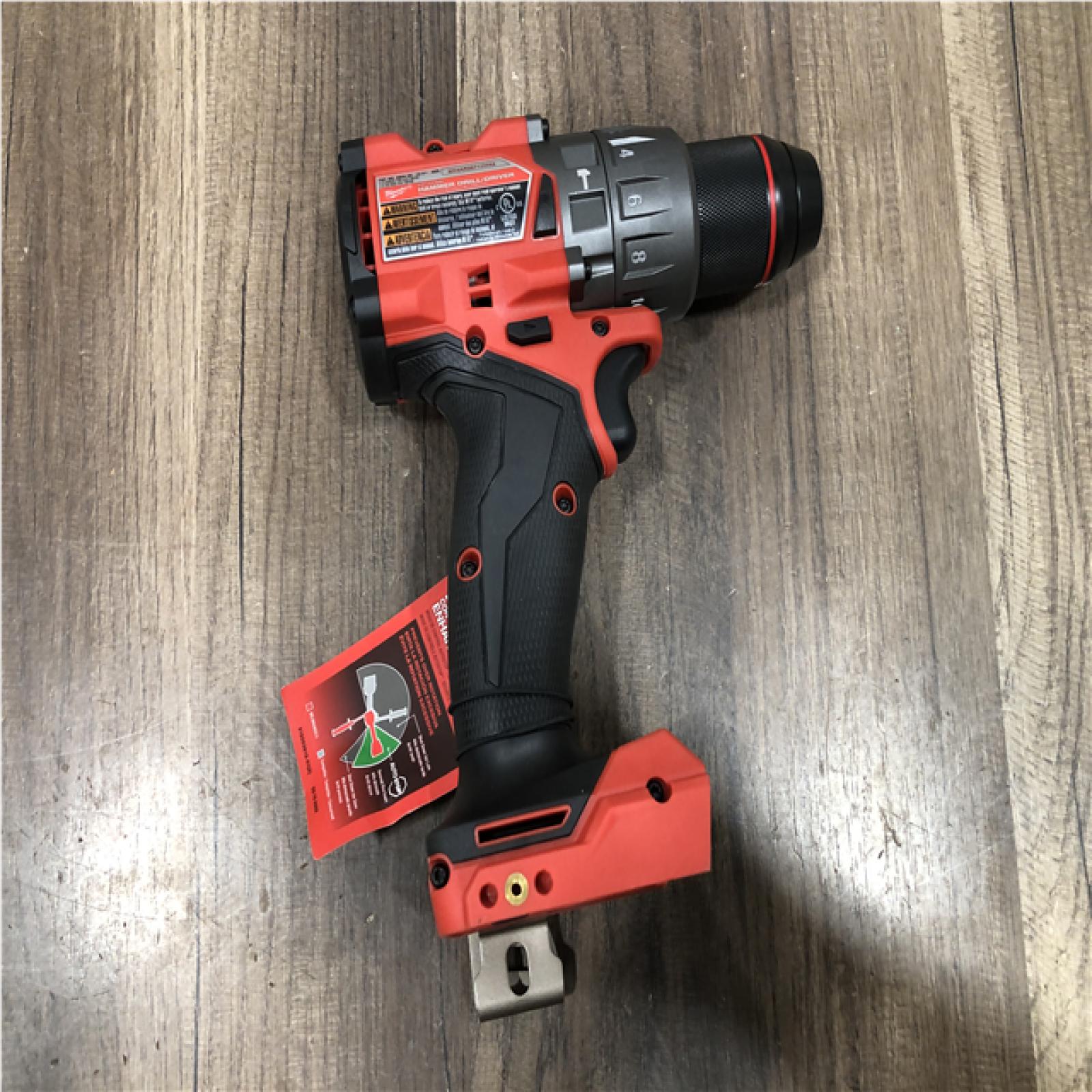 AS-IS Milwaukee FUEL 18V Lithium-Ion Brushless Cordless 1/2 in. Hammer Drill Driver Kit