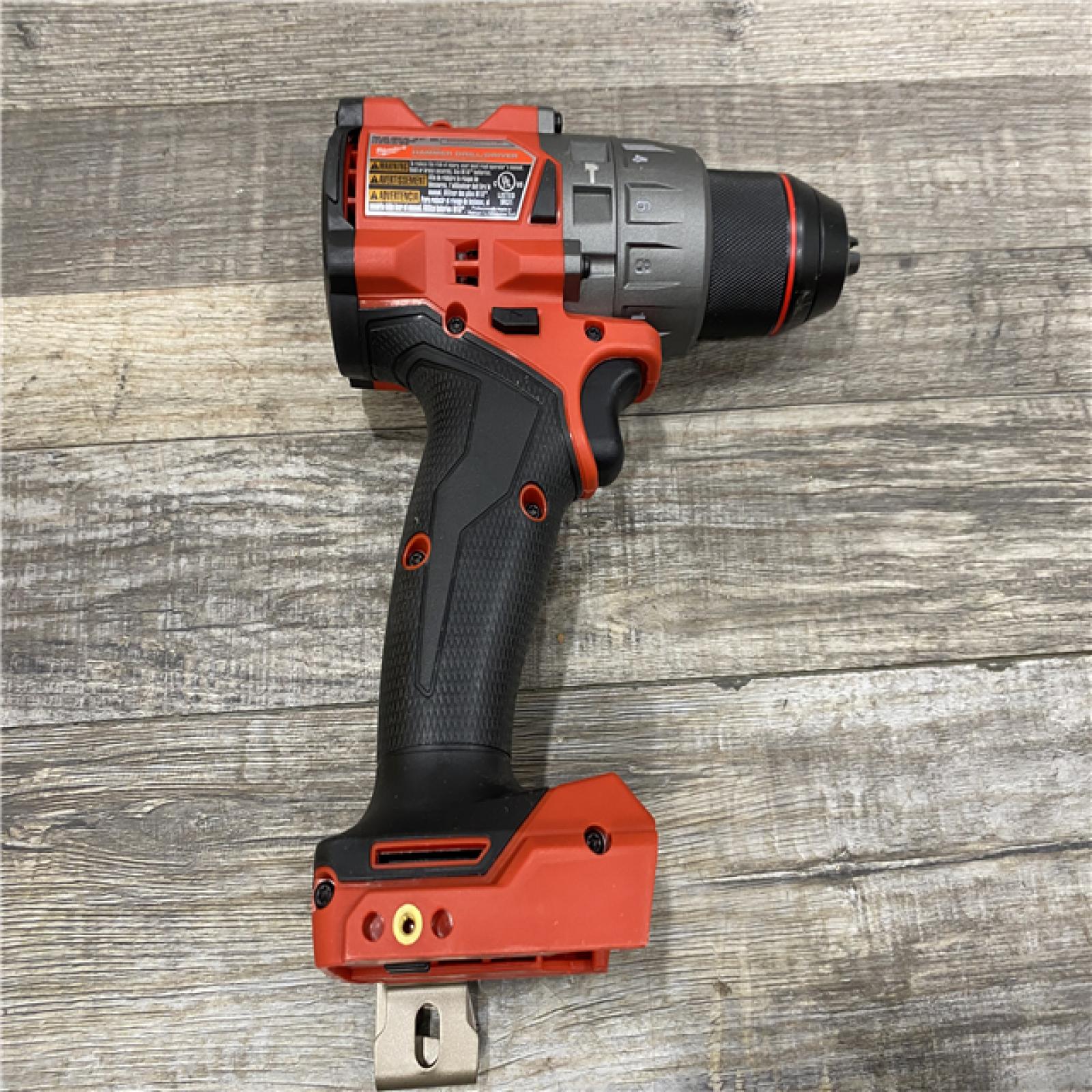 AS-IS Milwaukee FUEL 18V Lithium-Ion Brushless Cordless 1/2 in. Hammer Drill Driver Kit