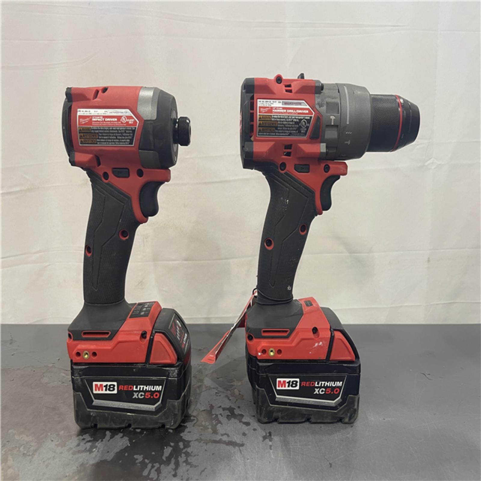 AS-IS- MILWAUKEE FUEL 18V Lithium-Ion Brushless Cordless Hammer Drill and Impact Driver Combo Kit