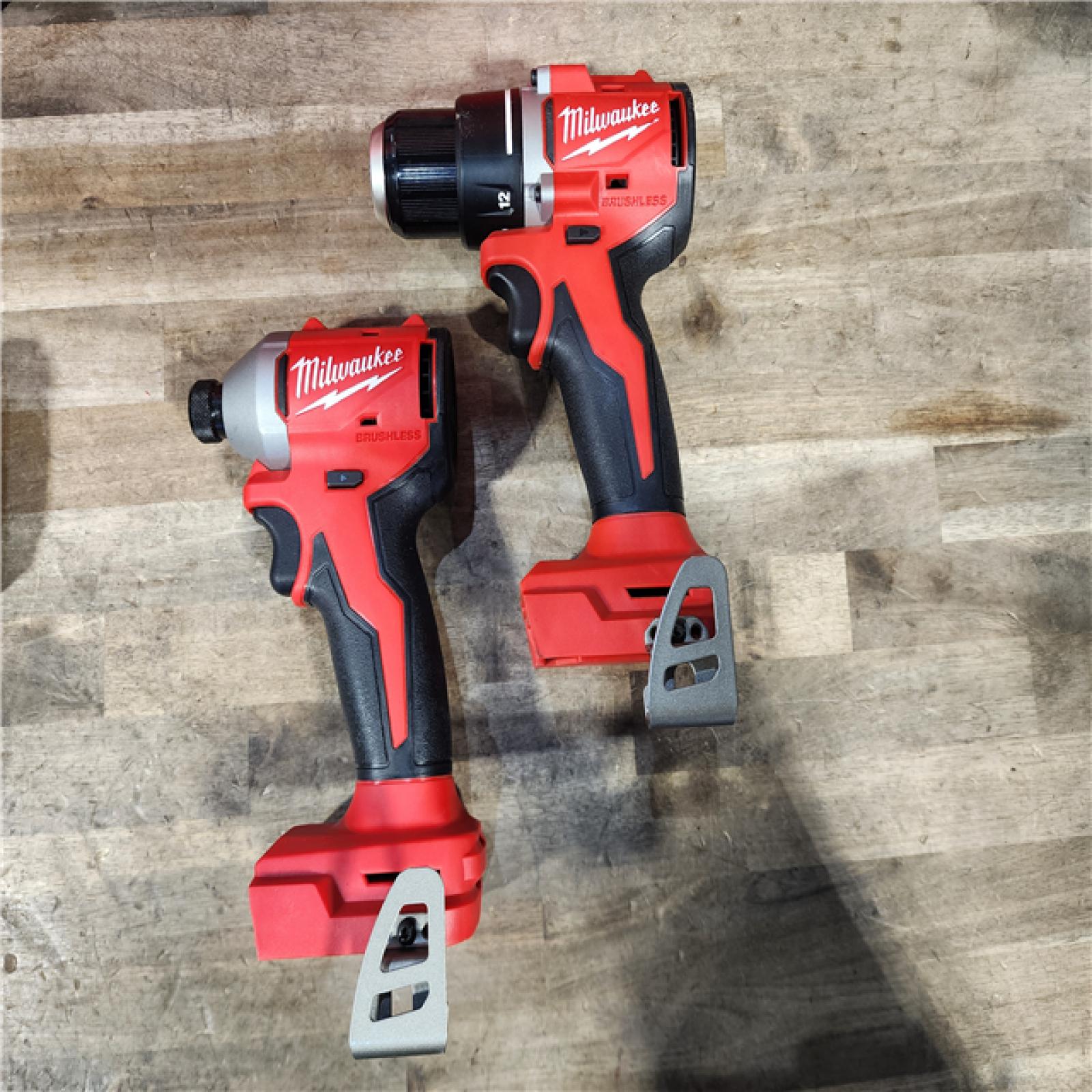 HOUSTON LOCATION - AS-IS Milwaukee M18 18V Lithium-Ion Brushless Cordless Compact Drill/Impact Combo Kit (2-Tool) W/(2) 2.0 Ah Batteries  Charger & Bag