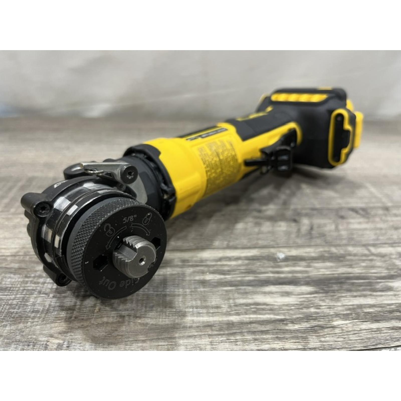 AS-IS DEWALT ATOMIC 20V MAX Cordless 4-1/2 in. Angle Grinder with Paddle Switch (Tool Only)