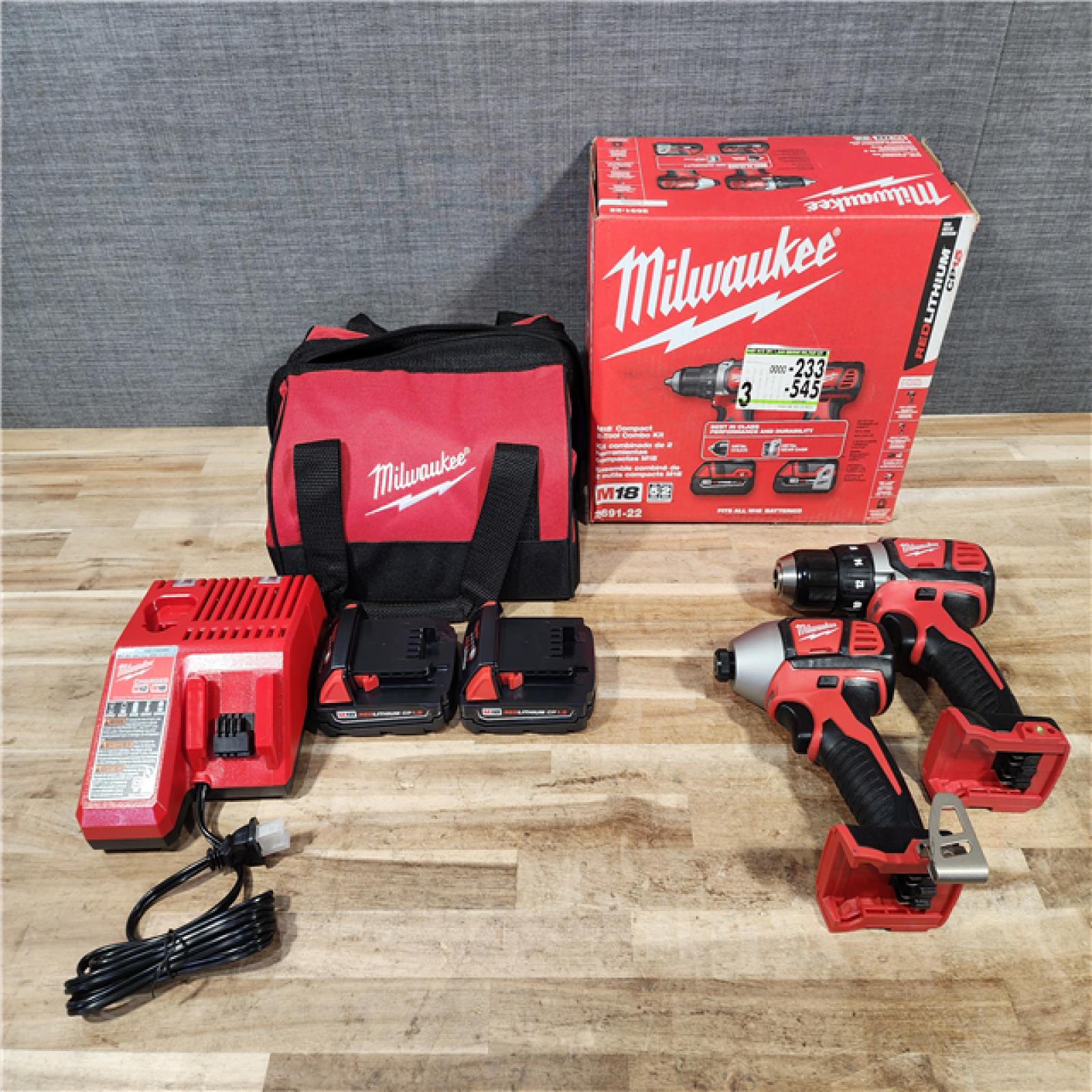 HOUSTON LOCATION - AS-IS Milwaukee 18V Lithium-Ion Cordless Drill Driver/Impact Driver Combo Kit