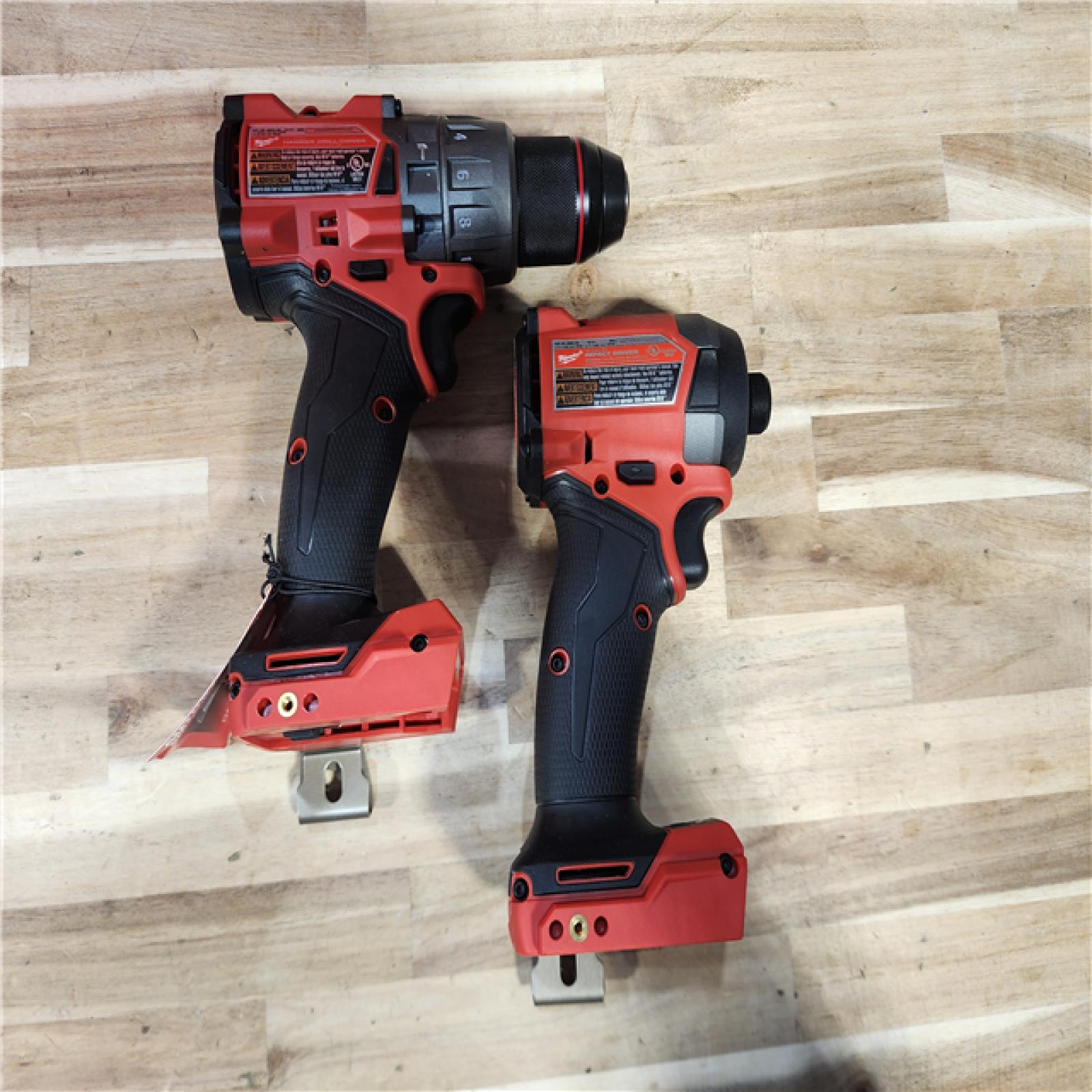 HOUSTON LOCATION - AS-IS (APPEARS LIKE NEW) Milwaukee  FUEL 18V Lithium-Ion Brushless Cordless Hammer Drill and Impact Driver Combo Kit