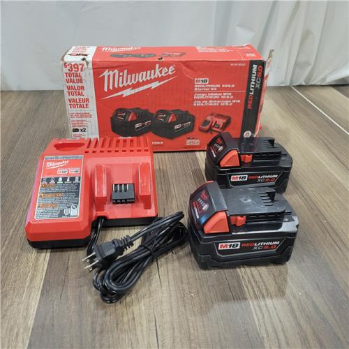 AS-IS  Milwaukee M18 18-Volt Lithium-Ion XC Starter Kit with Two 5.0Ah Batteries and Charger