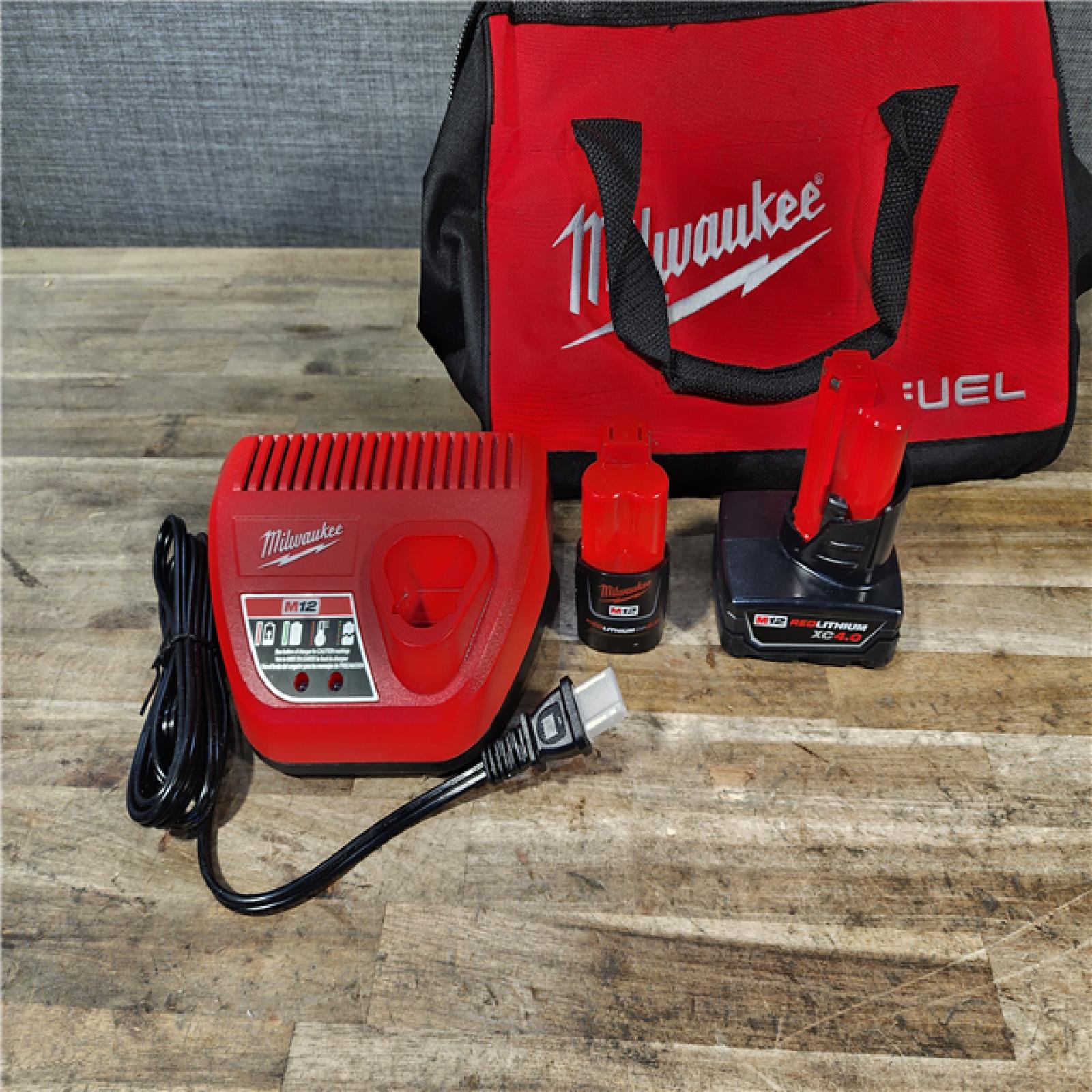 HOUSTON LOCATION - AS-IS Milwaukee FUEL 12-Volt Lithium-Ion Brushless Cordless Hammer Drill and Impact Driver Combo Kit