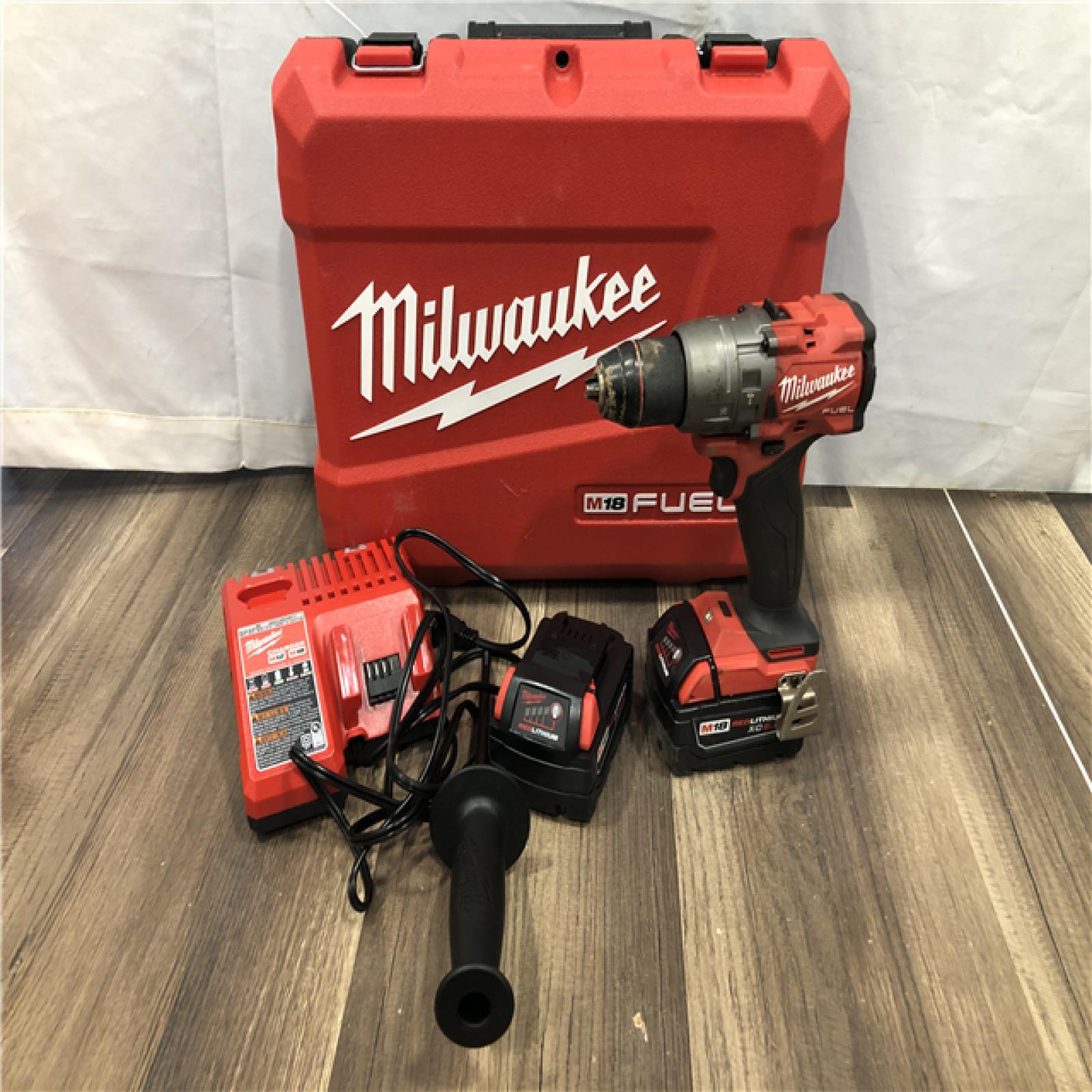 AS-IS Milwaukee FUEL 18V Lithium-Ion Brushless Cordless 1/2 in. Hammer Drill Driver Kit