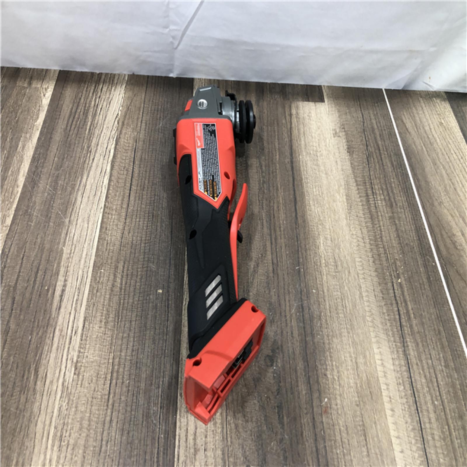 AS-IS Milwaukee FUEL 18V Lithium-Ion Brushless Cordless 4-1/2 in./5 in. Grinder w/Paddle Switch (Tool-Only)