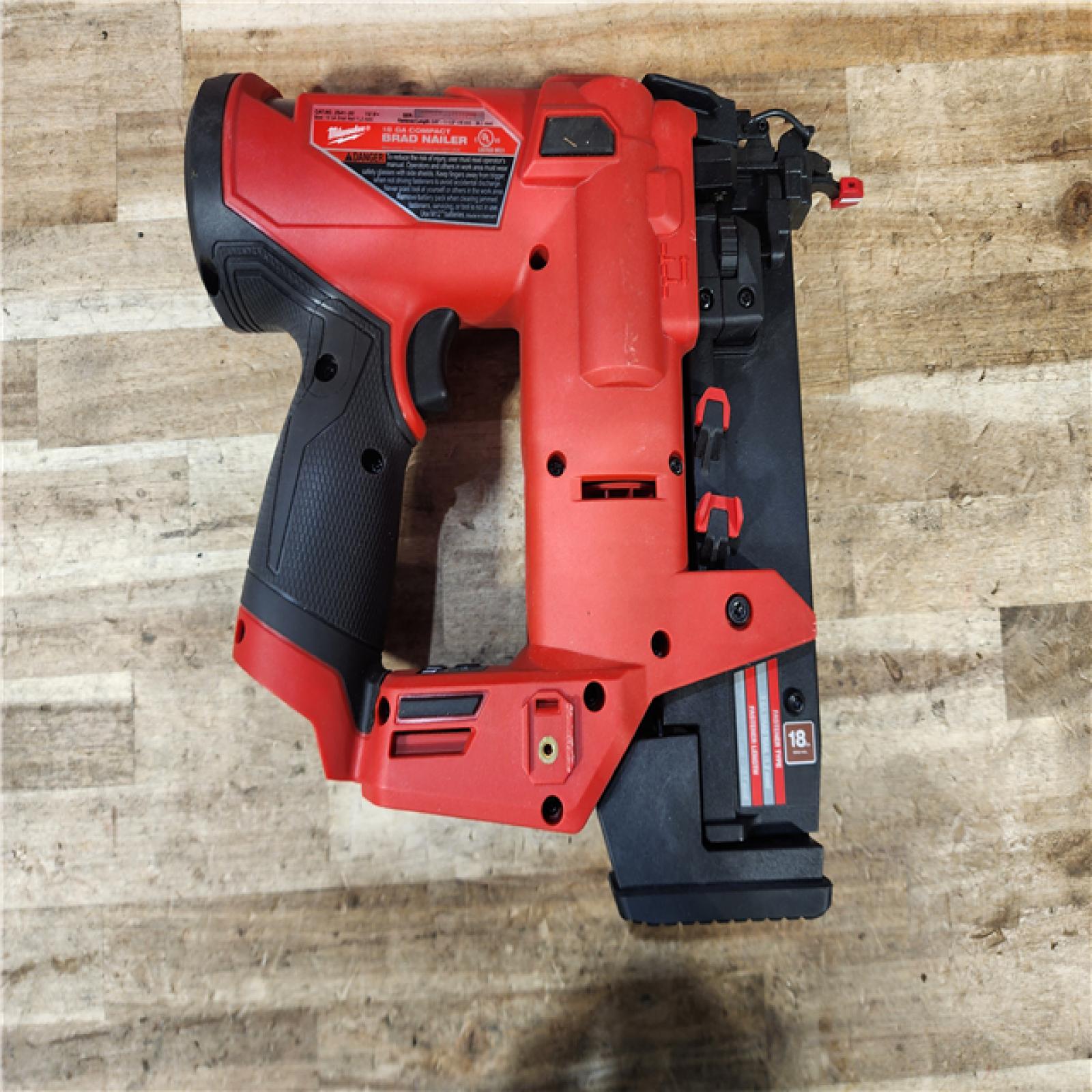 HOUSTON LOCATION - AS-IS Milwaukee FUEL 12-Volt Lithium-Ion Brushless Cordless 18-Gauge 1-1/2 in. Compact Brad Nailer (Tool Only)