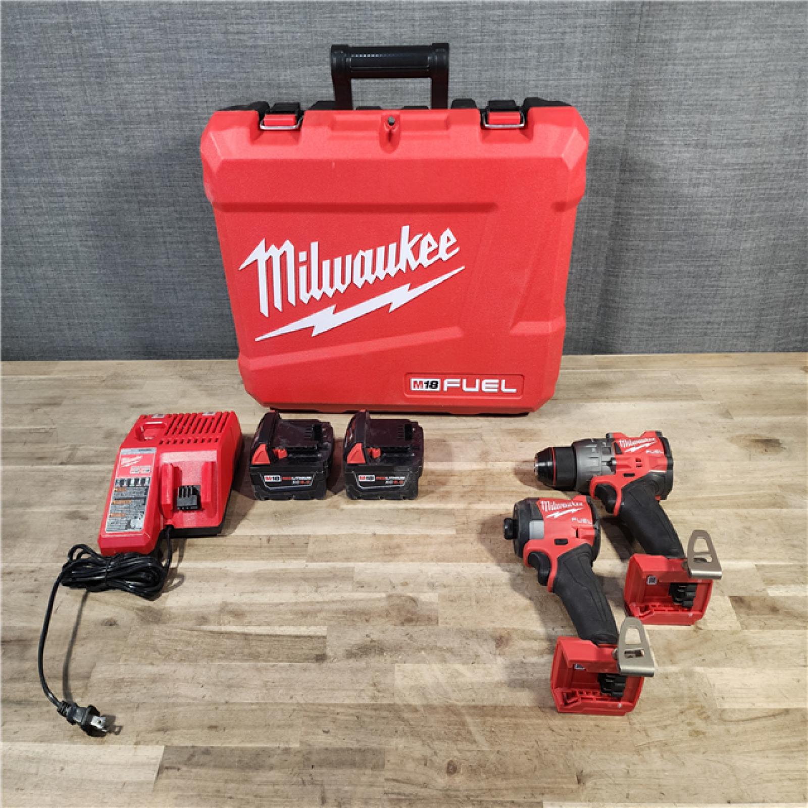 HOUSTON LOCATION - AS-IS MILWAUKEE FUEL 18V Lithium-Ion Brushless Cordless Hammer Drill and Impact Driver Combo Kit (2-Tool) with 2 Batteries