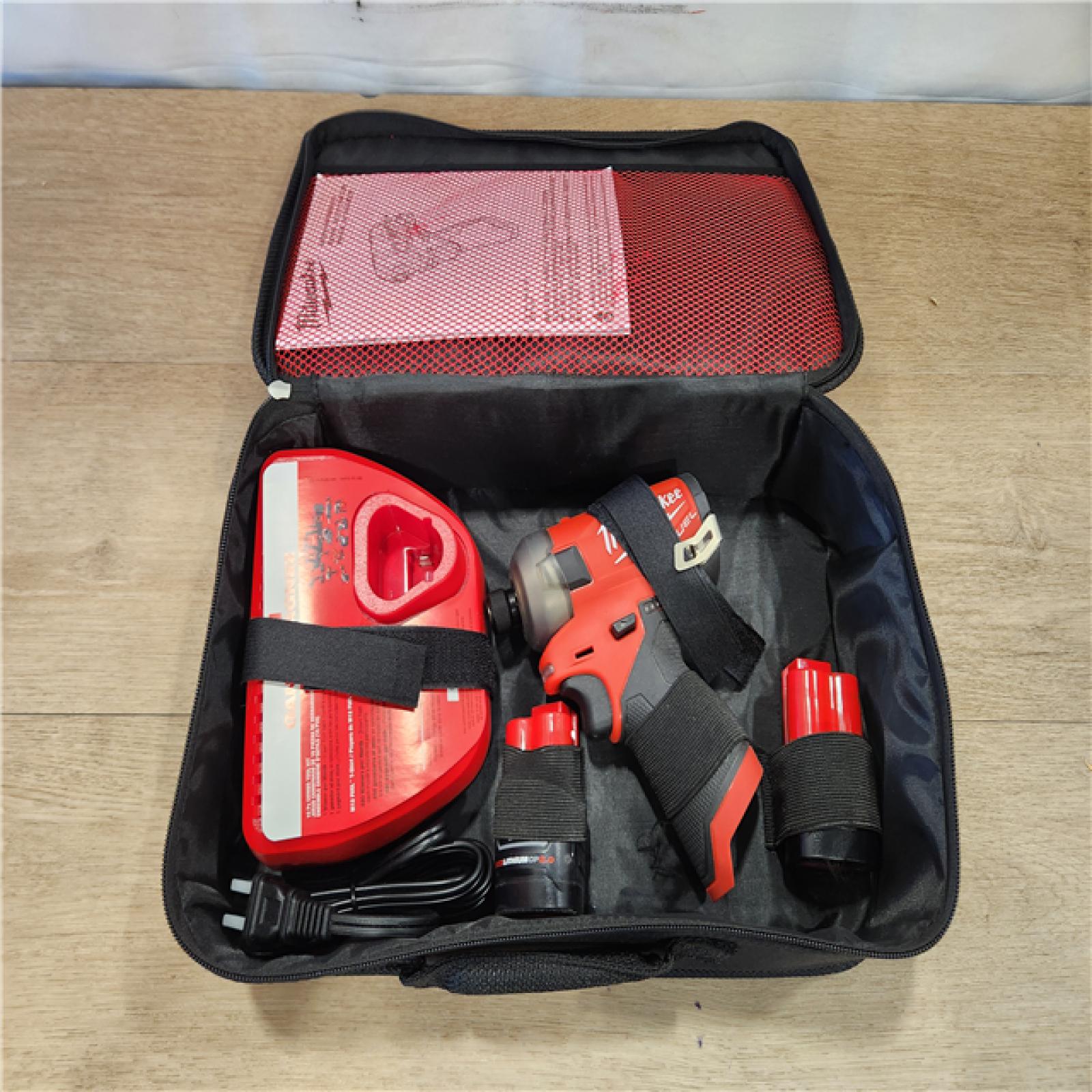 AS-IS- Milwaukee M12 FUEL SURGE 1/4 in. Cordless Brushless Hydraulic Impact Driver Kit (Battery & Charger)