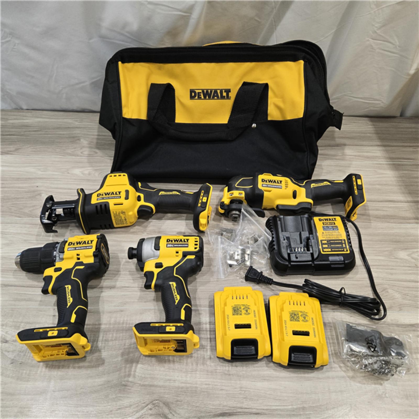 AS-IS DeWalt 20V MAX ATOMIC Cordless Brushless 4 Tool Combo Kit