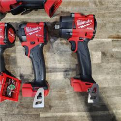 HOUSTON LOCATION - AS-IS (APPEARS LIKE NEW) Milwaukee M18 FUEL 18V Lithium-Ion Brushless Cordless Combo Kit with Two 5.0 Ah Batteries  1 Charger  2 Tool Bags (7-Tool)