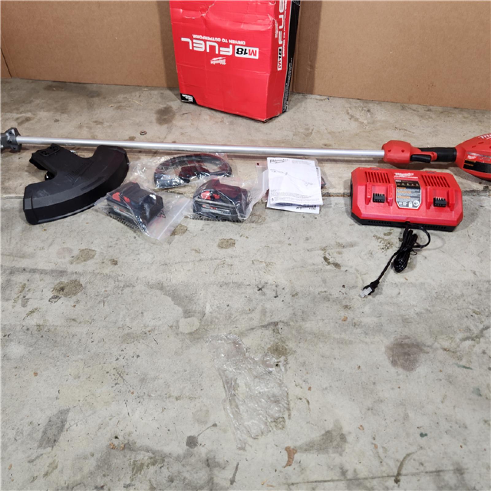 Houston location AS-IS Milwaukee M18 FUEL 18V Brushless Cordless 17 in. Dual Battery Straight Shaft String Trimmer with (2) 8.0 Ah Batteries and Charger
