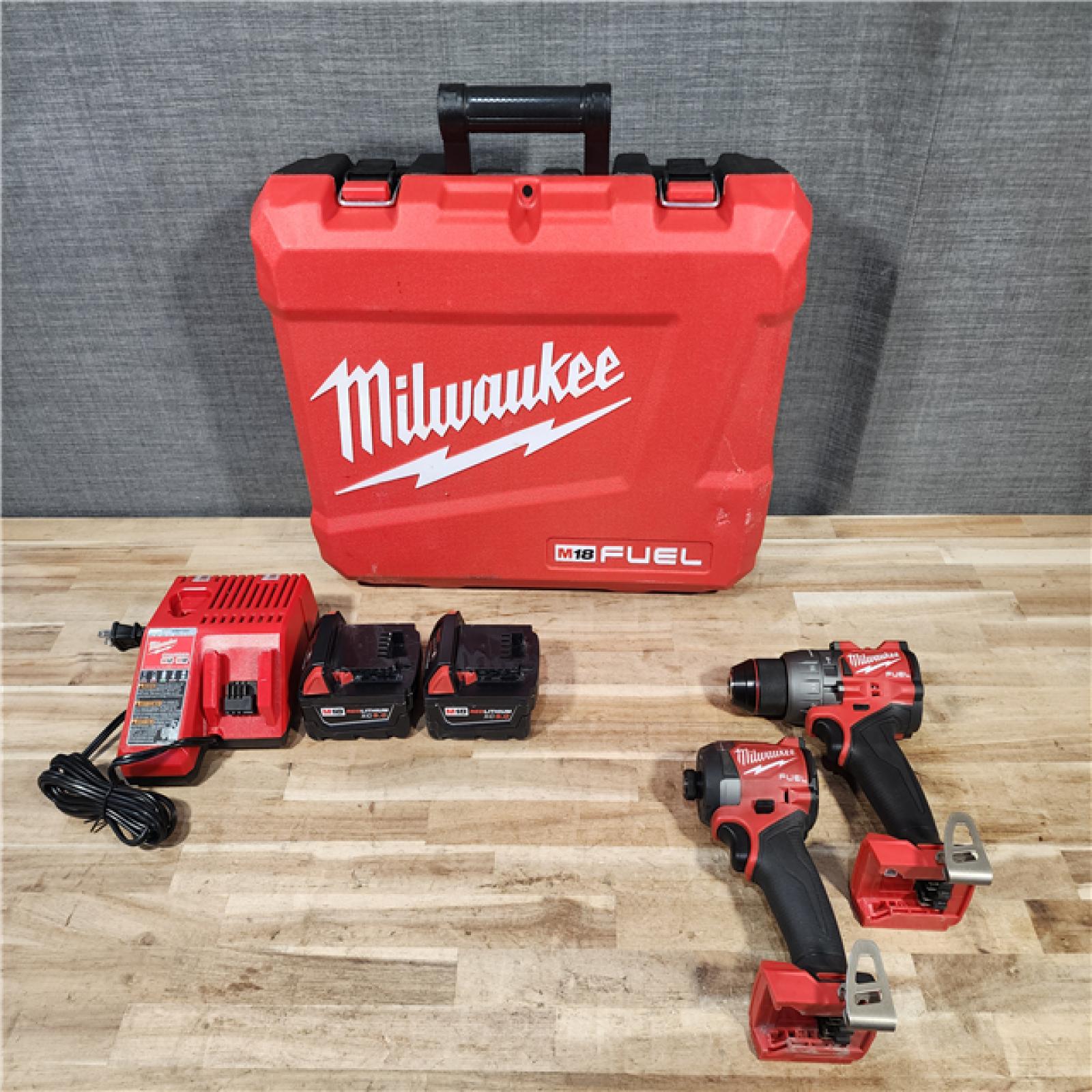 HOUSTON LOCATION - AS-IS Milwaukee FUEL 18V Lithium-Ion Brushless Cordless Hammer Drill and Impact Driver Combo Kit