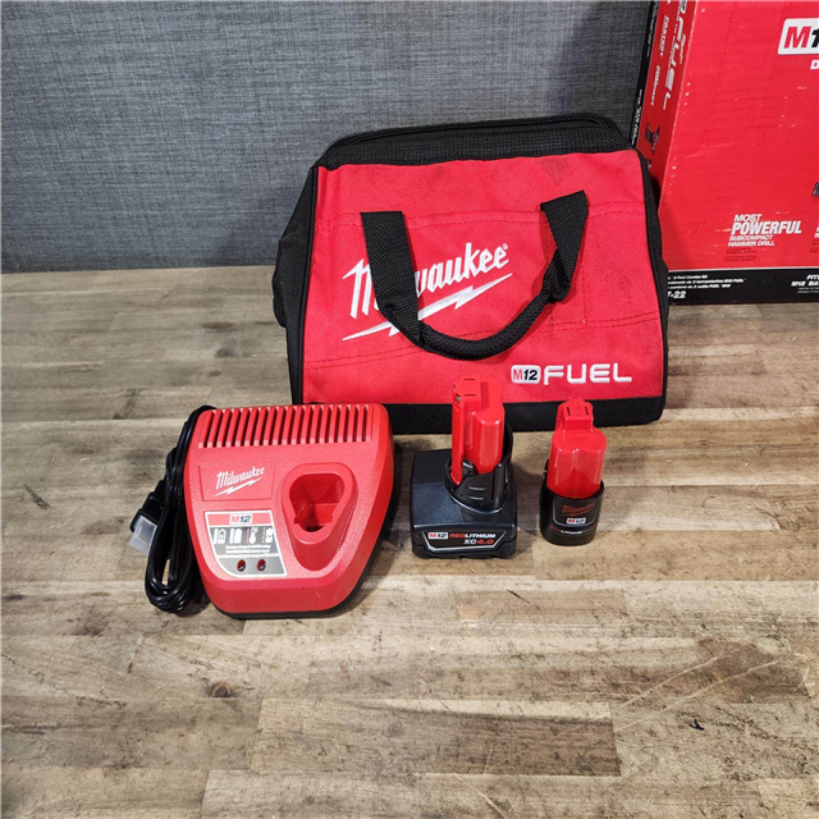 HOUSTON LOCATION - AS-IS Milwaukee FUEL 12-Volt Lithium-Ion Brushless Cordless Hammer Drill and Impact Driver Combo Kit