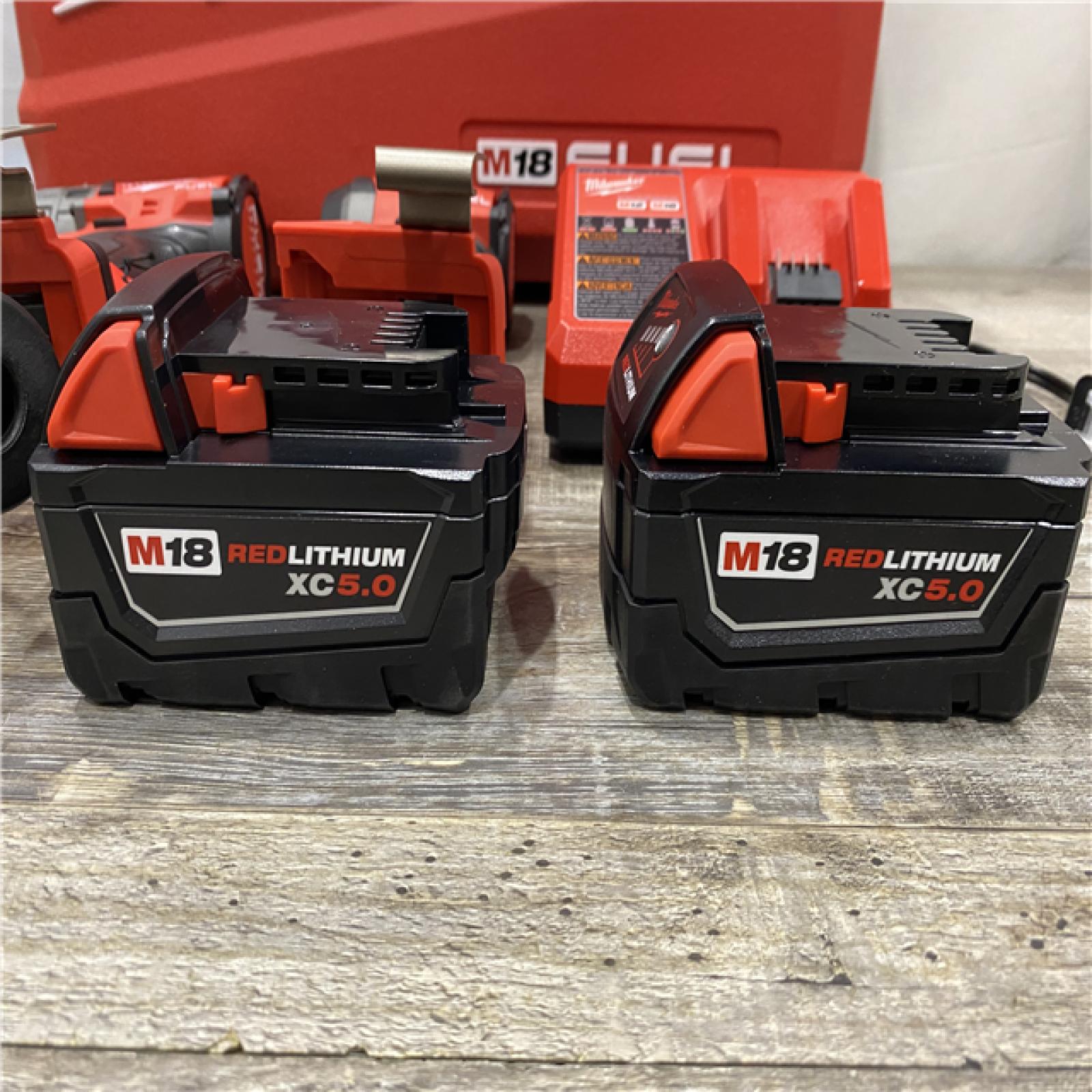 LIKE NEW - Milwaukee FUEL 18V Lithium-Ion Brushless Cordless Hammer Drill and Impact Driver Combo Kit