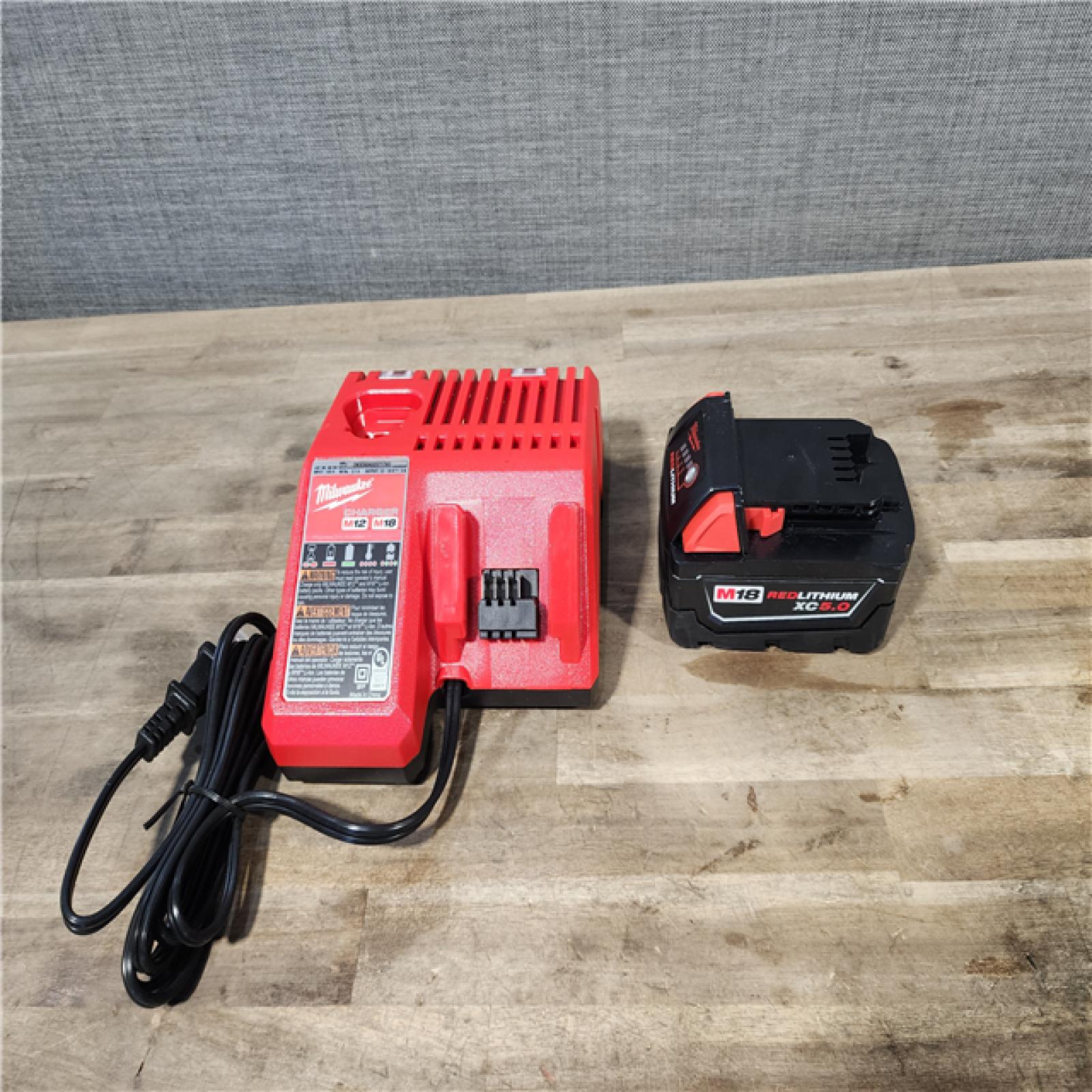 HOUSTON LOCATION - AS-IS Milwaukee M18 FUEL 1/2 in. Cordless Brushless Impact Wrench Kit (Battery & Charger)