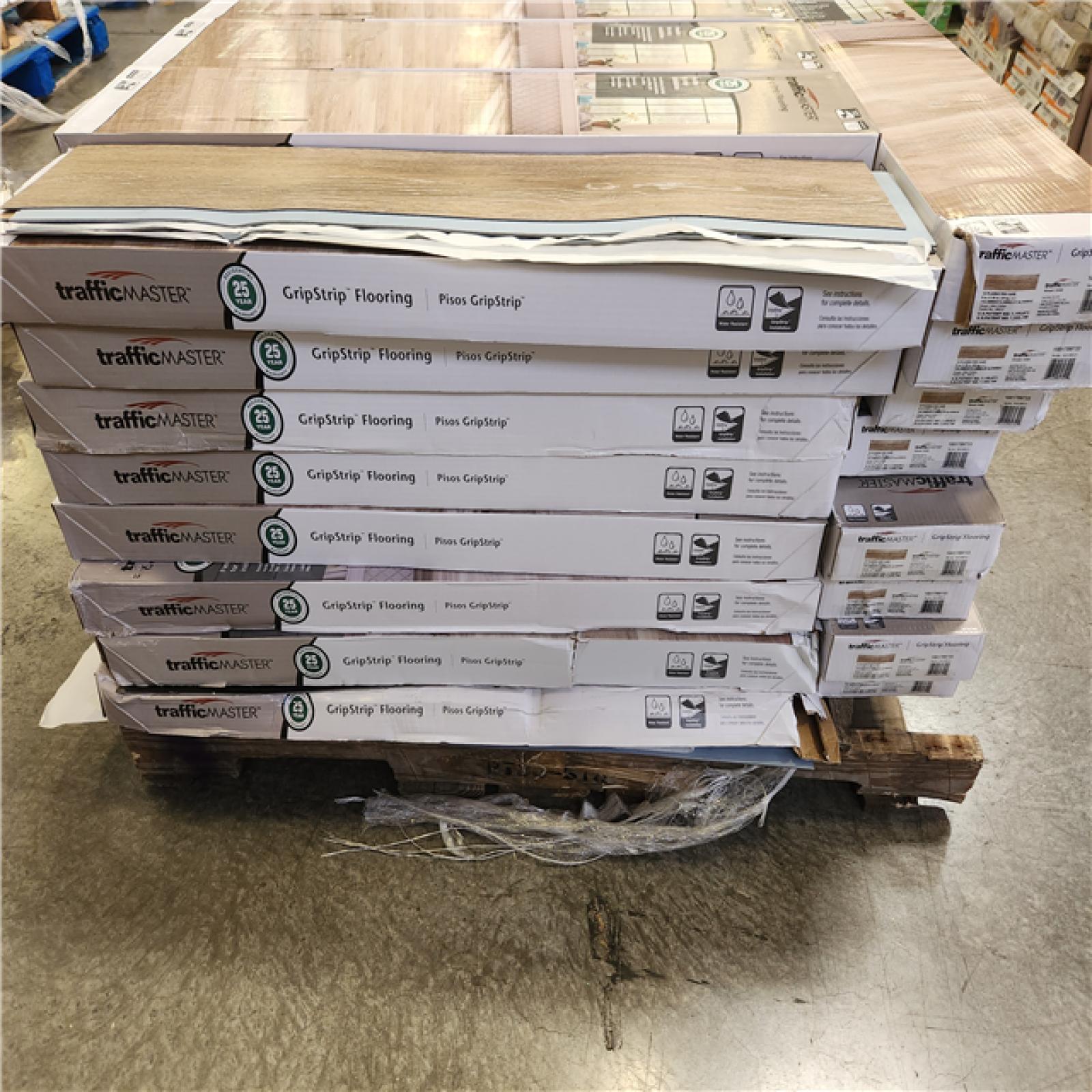 Phoenix TrafficMaster Khaki Oak 4 MIL x 6 in. W x 36 in. L Grip Strip Water Resistant Luxury Vinyl Plank Flooring (1 152 sqft/ 48 case)