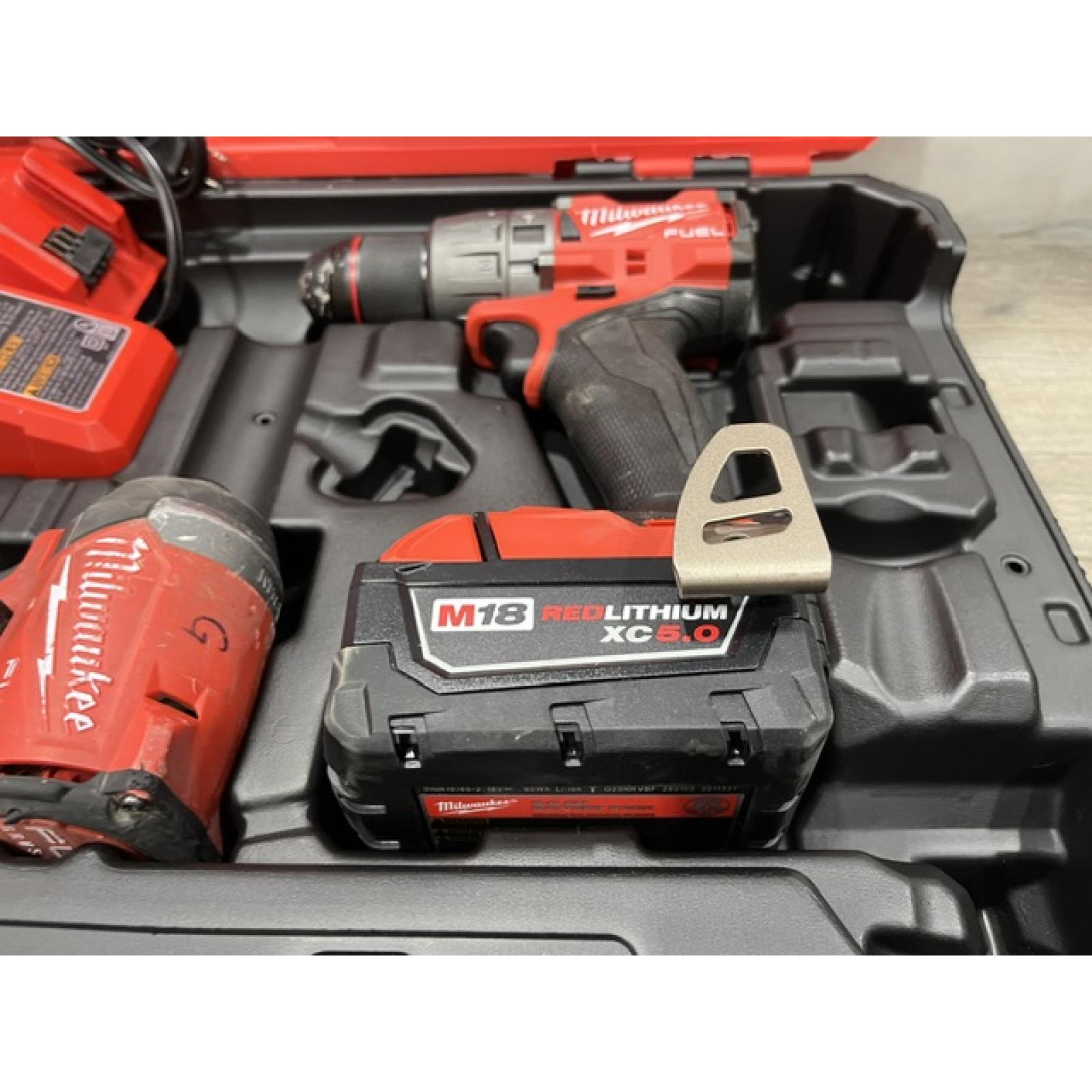 AS-IS Milwaukee FUEL 18V Lithium-Ion Brushless Cordless Hammer Drill and Impact Driver Combo Kit