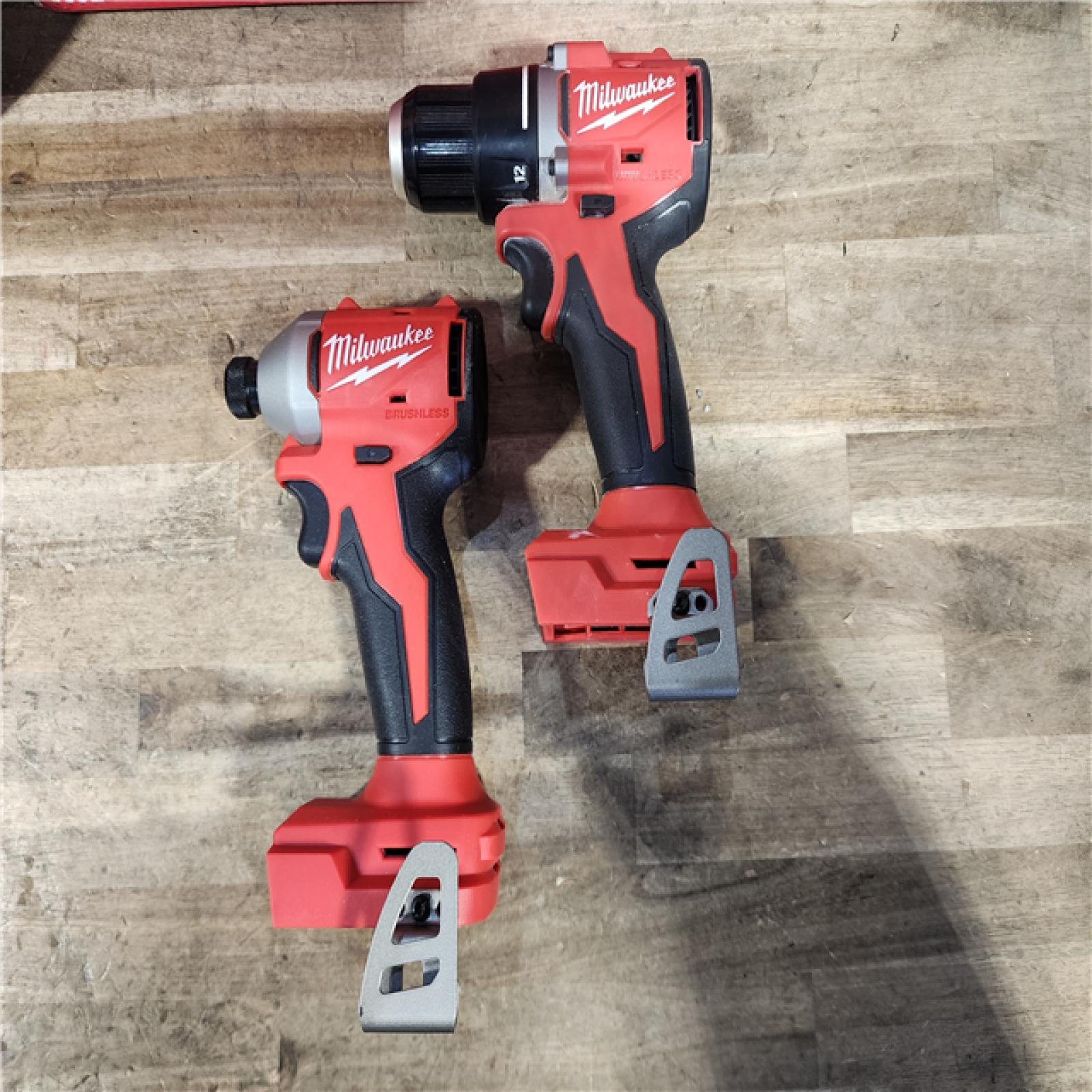HOUSTON LOCATION - AS-IS Milwaukee M18 18V Lithium-Ion Brushless Cordless Compact Drill/Impact Combo Kit (2-Tool) W/(2) 2.0 Ah Batteries  Charger & Bag