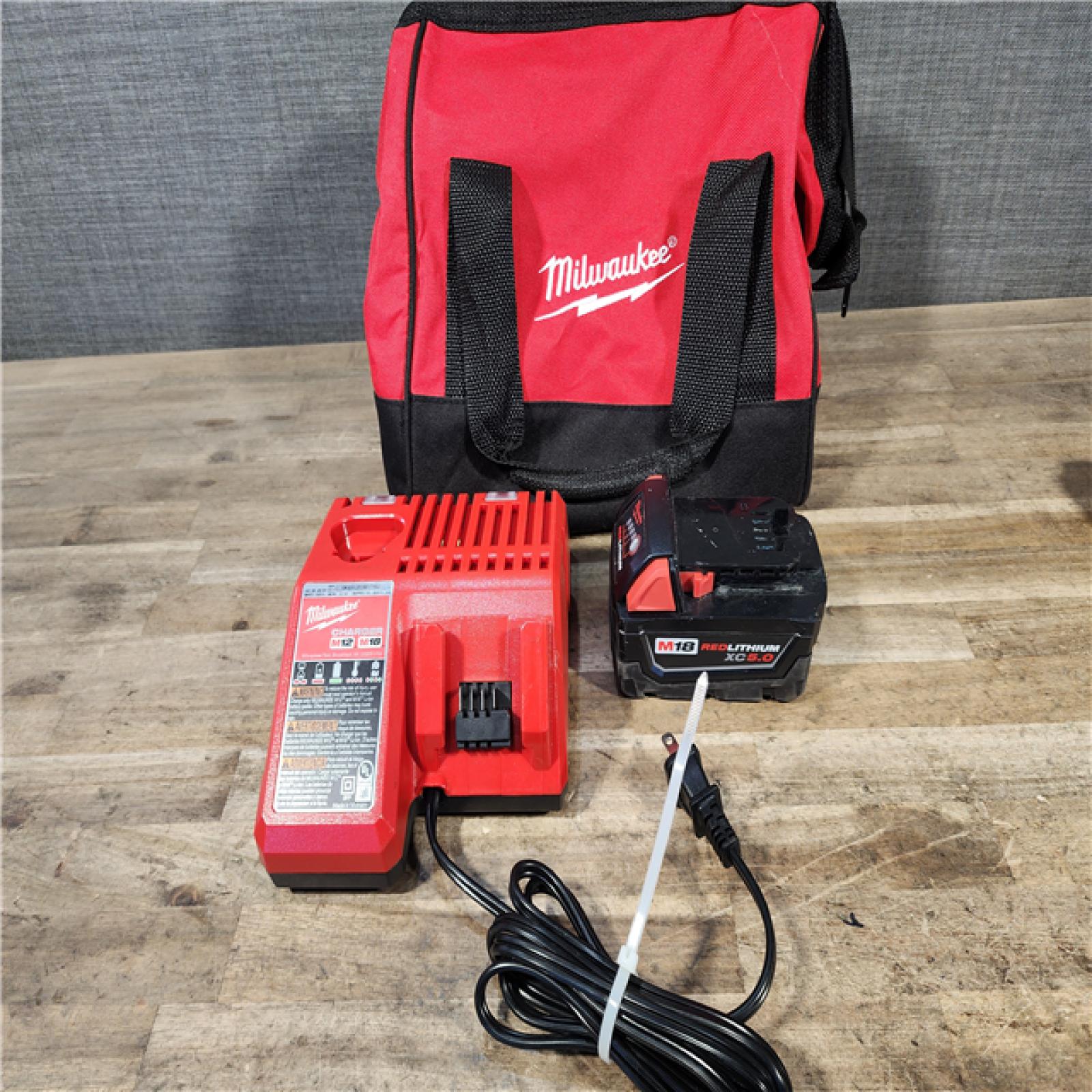 HOUSTON LOCATION - AS-IS Milwaukee FUEL Gen-2 18V Lithium-Ion Brushless Cordless Mid Torque 1/2 in. Impact Wrench w/Friction Ring W/ BATTERY & CHARGER