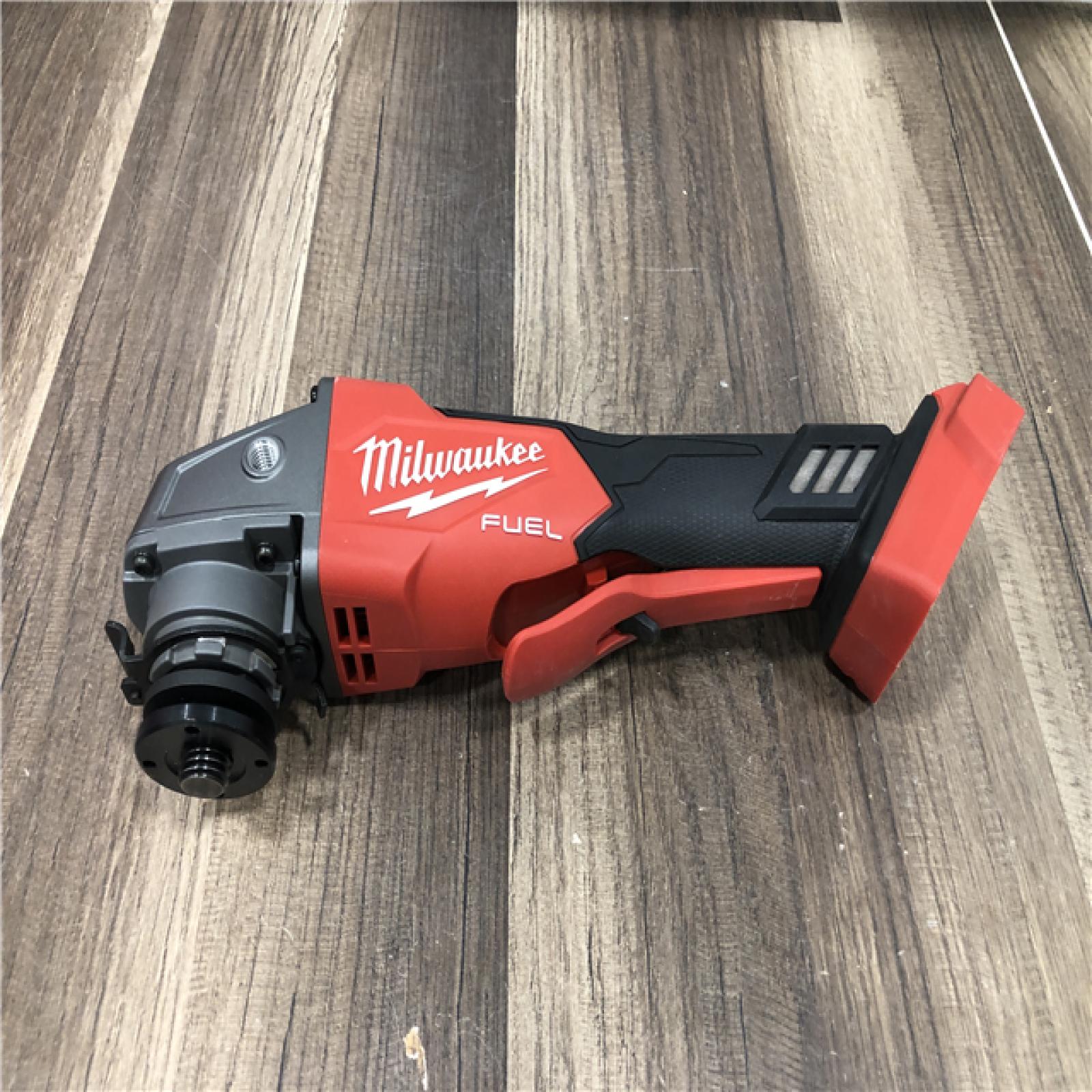 AS-IS Milwaukee FUEL 18V Lithium-Ion Brushless Cordless 4-1/2 in./5 in. Grinder w/Paddle Switch (Tool-Only)