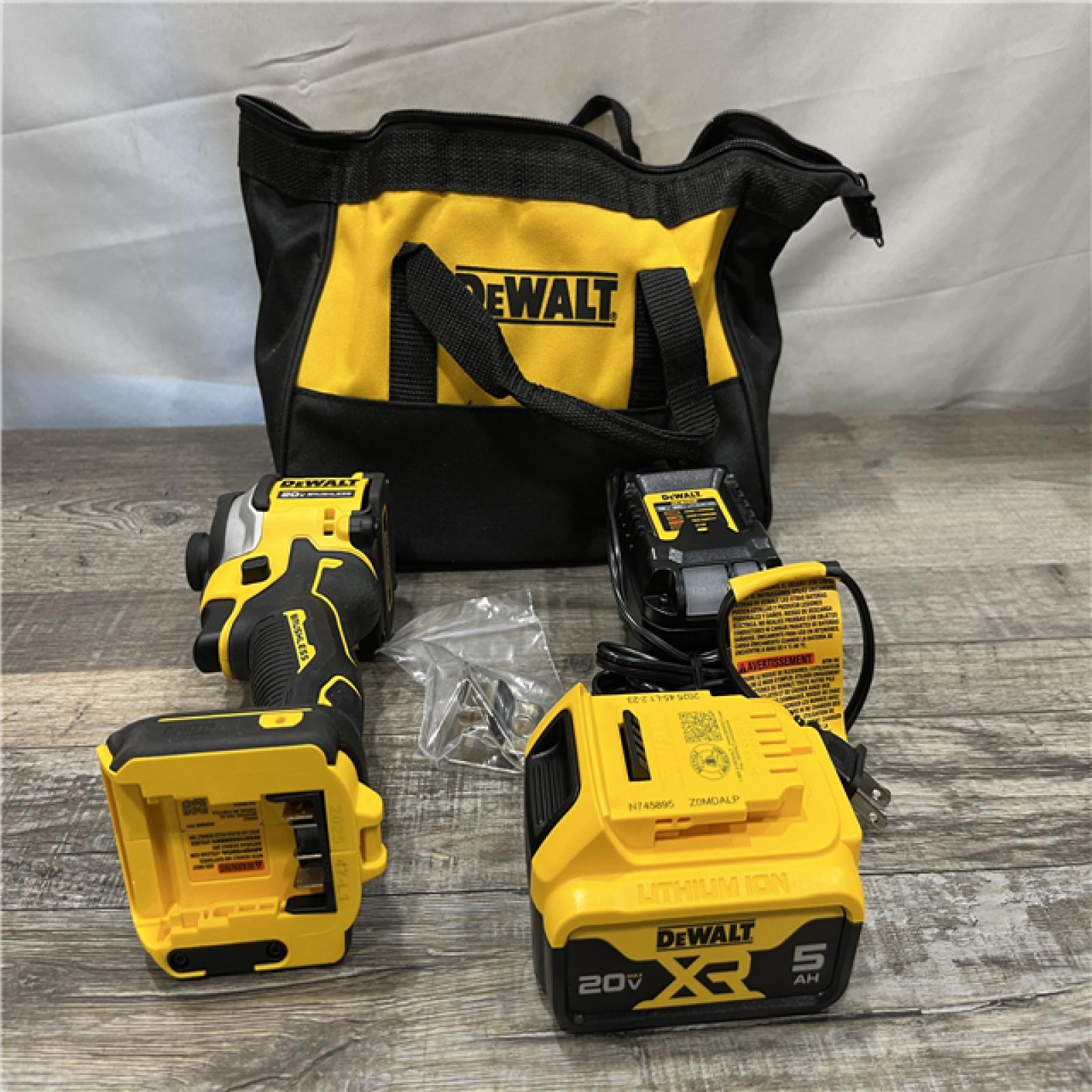 AS-IS DEWALT ATOMIC 20V MAX Lithium-Ion Cordless 1/4 in. Brushless Impact Driver Kit