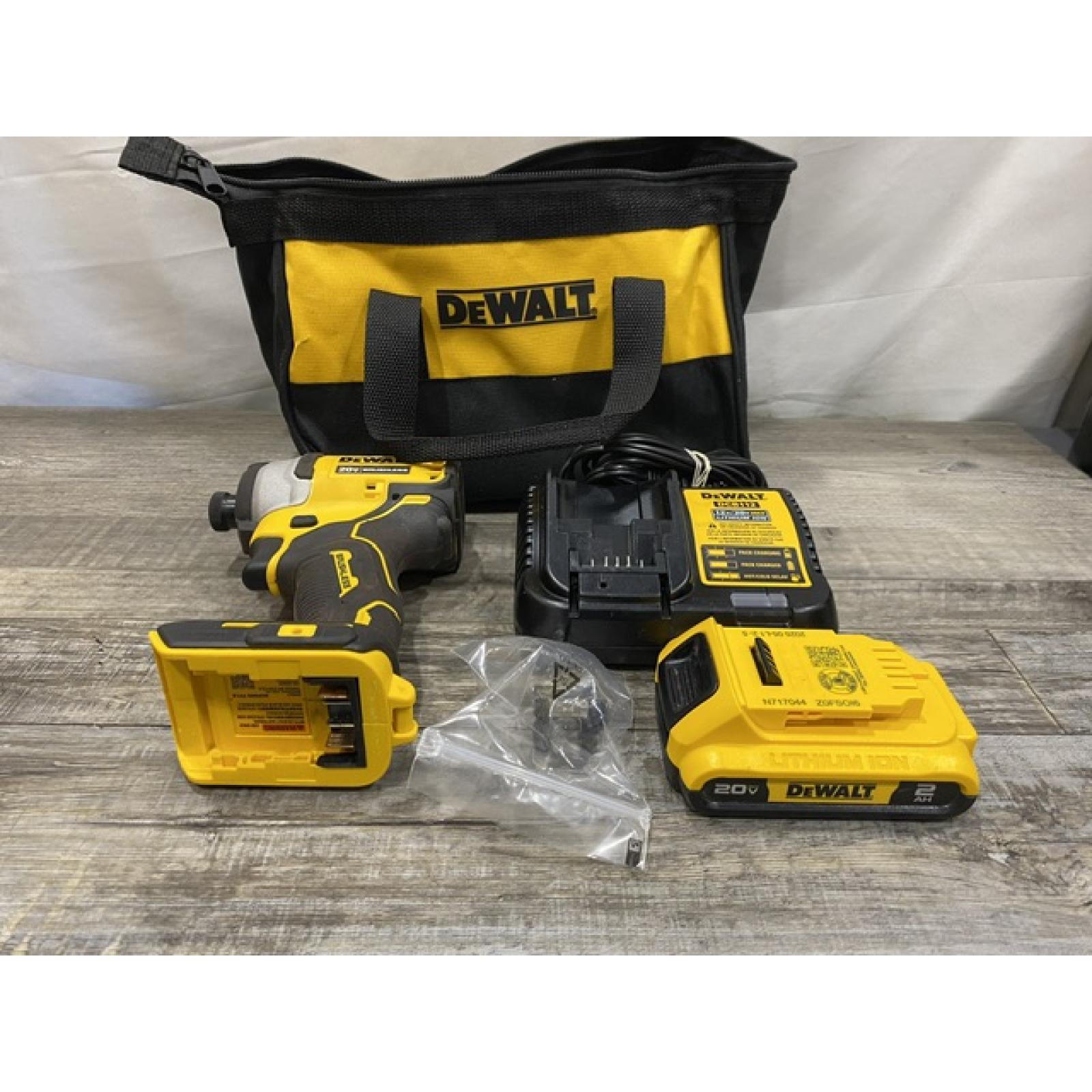 AS-IS DEWALT Atomic 20V Max Lithium-Ion Brushless Cordless Compact 1/4 in. Impact Driver Kit