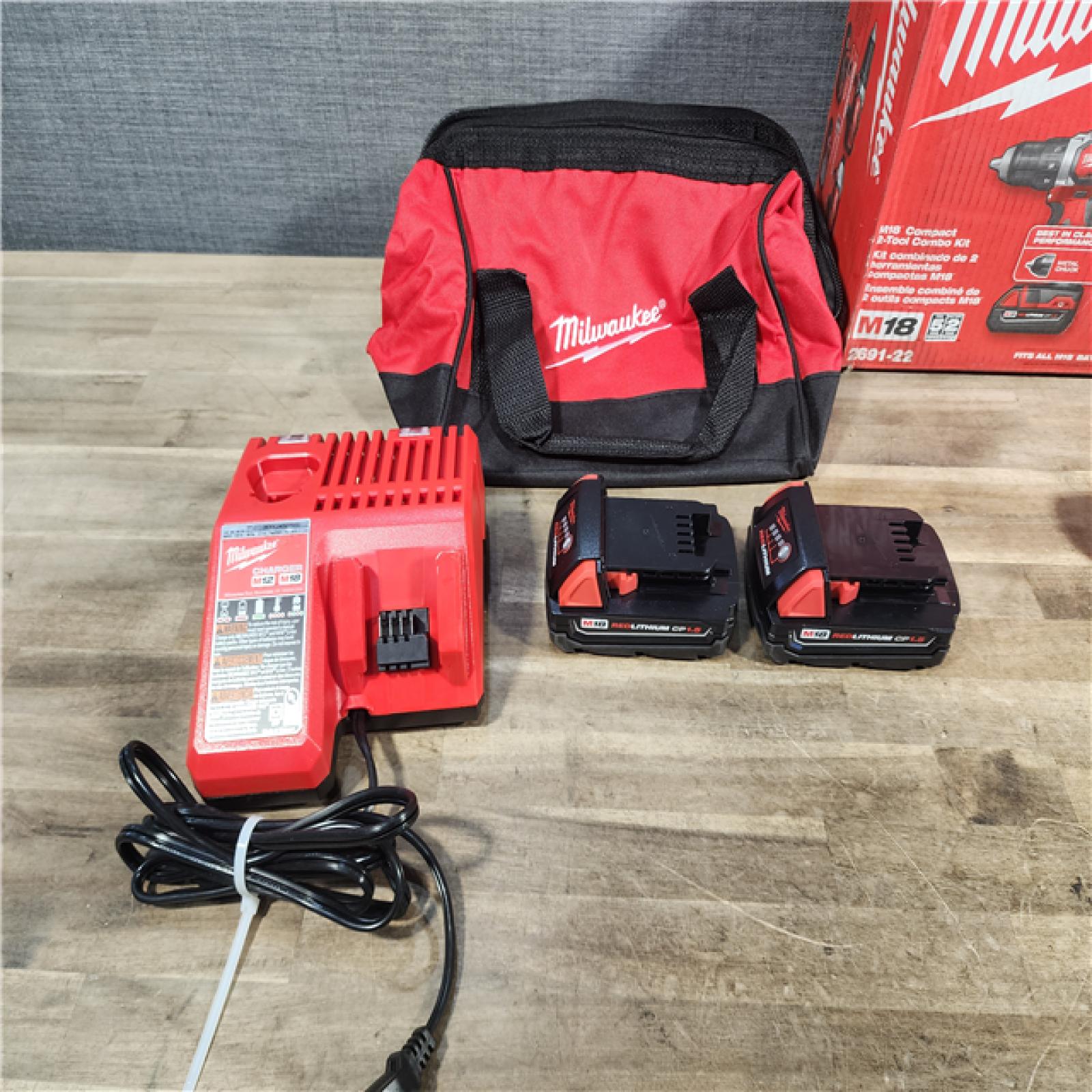 HOUSTON LOCATION - AS-IS Milwaukee 18V Cordless Brushed 2 Tool Drill/Driver and Impact Driver Kit