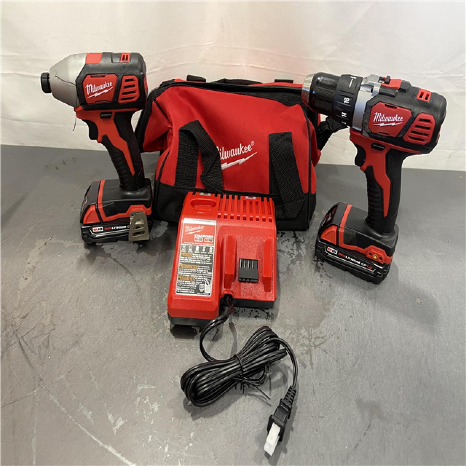 AS-IS - Milwaukee M18 18V Lithium-Ion Cordless Drill Driver/Impact Driver Combo Kit