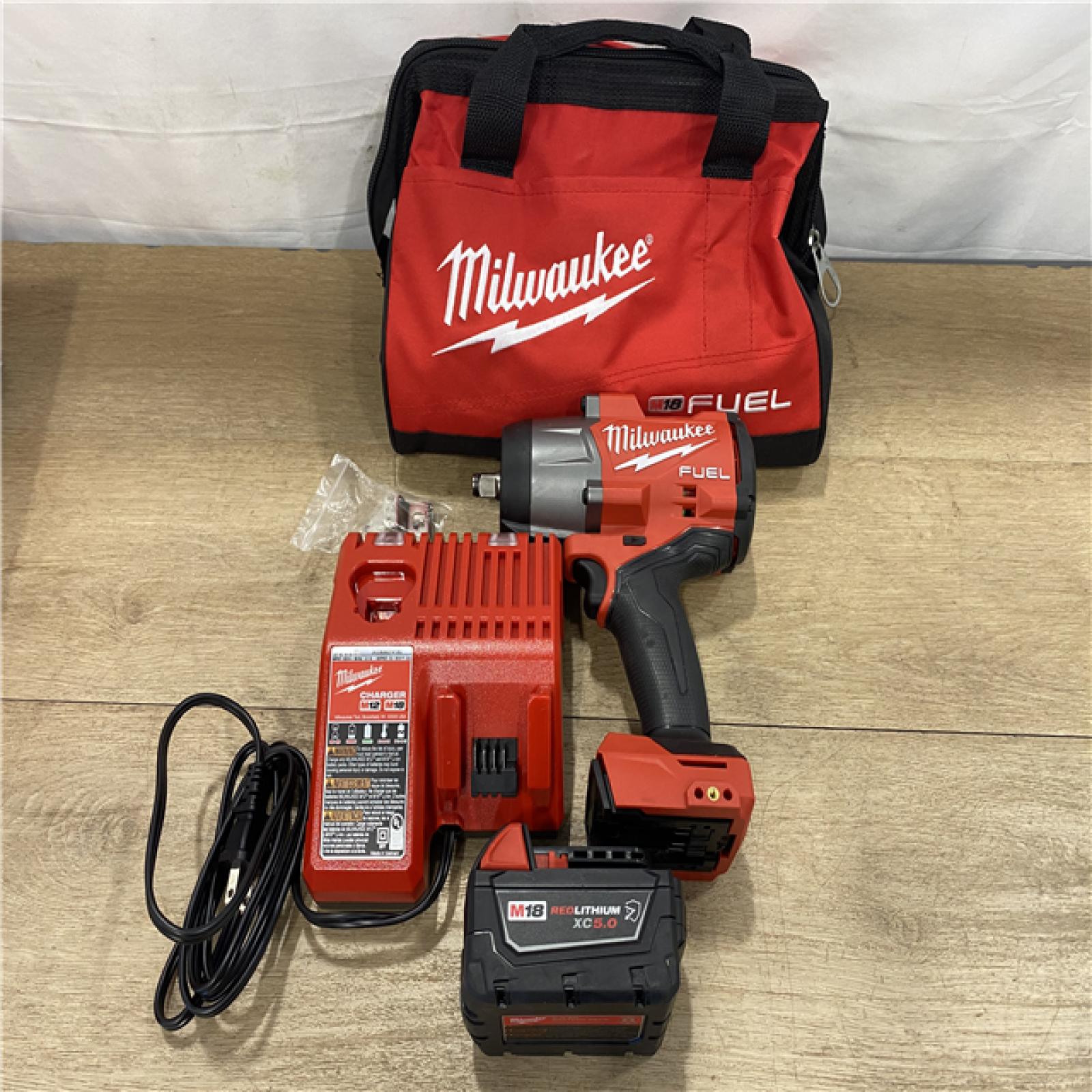 AS-IS Milwaukee FUEL 18V Lithium-Ion Brushless Cordless 1/2 in. Impact Wrench w/Friction Ring Kit