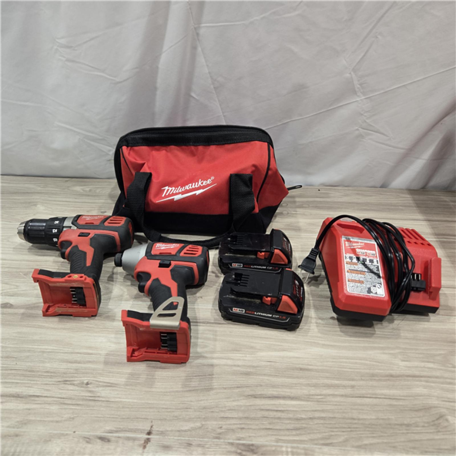 AS-IS Milwaukee 18V Cordless Brushed 2-Tool Drill/Driver and Impact Driver Kit
