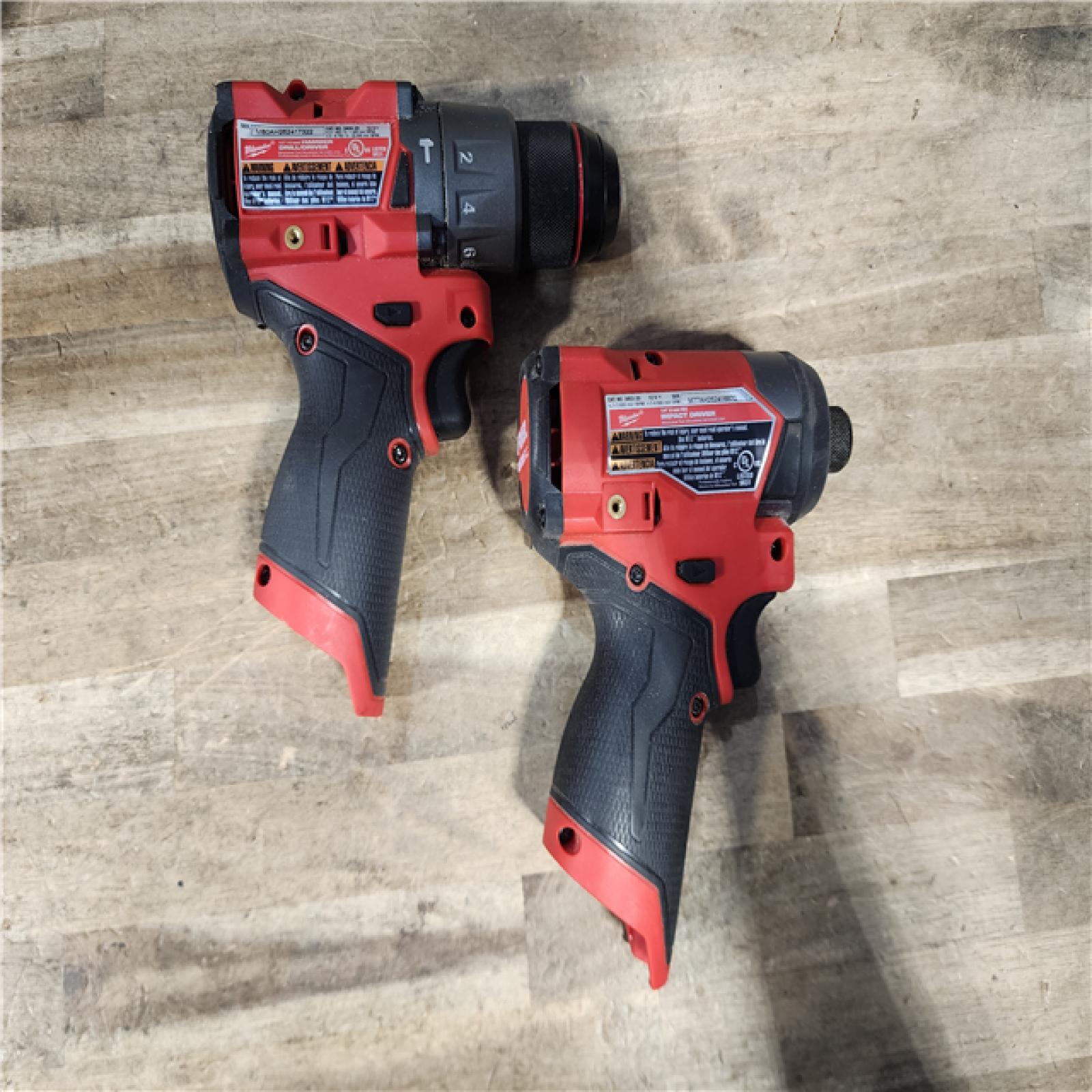 HOUSTON LOCATION - AS-IS Milwaukee FUEL 12-Volt Lithium-Ion Brushless Cordless Hammer Drill and Impact Driver Combo Kit