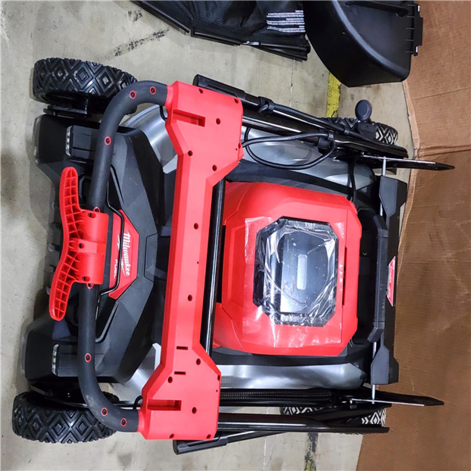 HOUSTON LOCATION - AS-IS Milwaukee M18 FUEL Brushless Cordless 21 in. Walk Behind Dual Battery Self-Propelled Mower Kit W/ BATTERY CHARGER