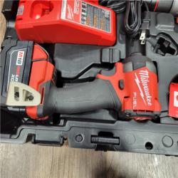 AS-IS MILWAUKEE M18 FUEL 18V Lithium-Ion Brushless Cordless Hammer Drill and Impact Driver Combo Kit (2-Tool) with 2 Batteries