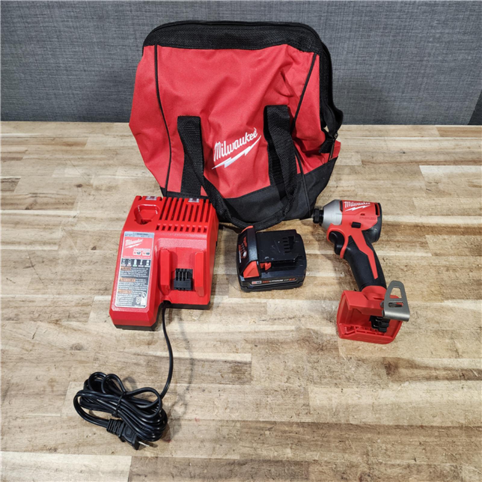 HOUSTON LOCATION - AS - IS Milwaukee  18V Lithium-Ion Brushless Cordless 1/4 in. Compact Impact Driver COMBO KIT