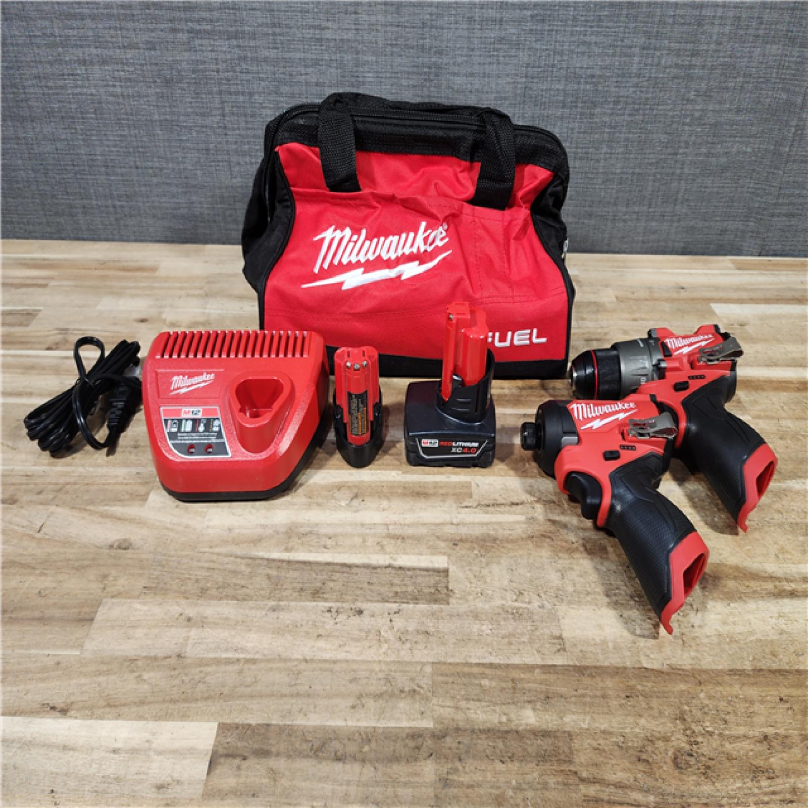 HOUSTON LOCATION - AS - IS Milwaukee FUEL 12-Volt Lithium-Ion Brushless Cordless Hammer Drill and Impact Driver Combo Kit