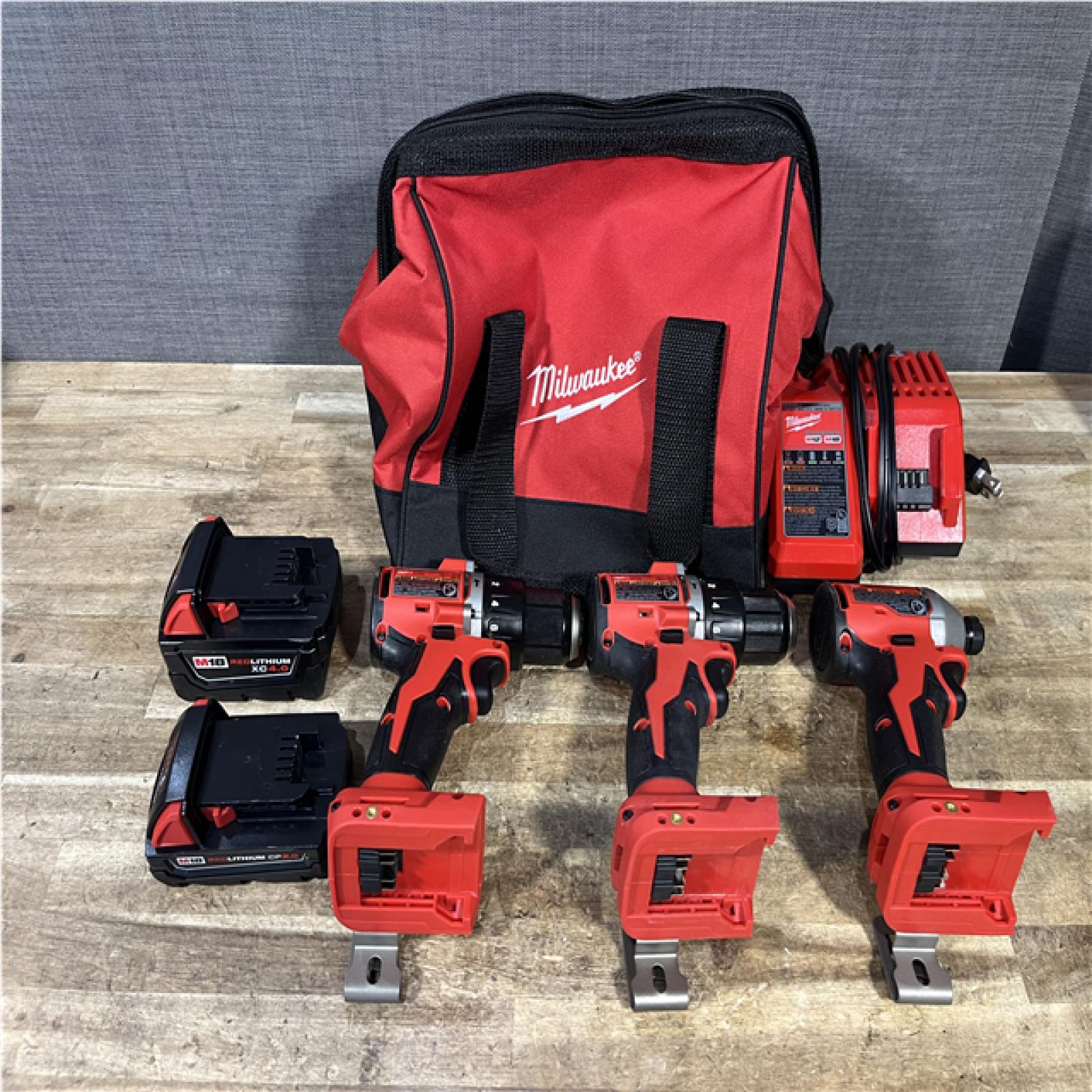 Houston Location AS-IS Milwaukee Hammer Drill Drivers QTY/2 and Impact Driver and Batteries QTY/2 with Charger