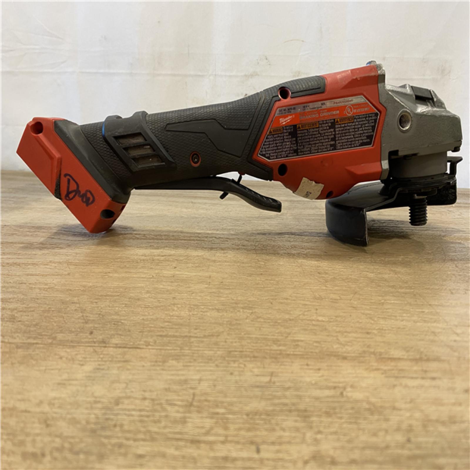 AS-IS Milwaukee FUEL 18-Volt Lithium-Ion Brushless Cordless 4-1/2 in./6 in. Braking Grinder with Paddle Switch (Tool-Only)