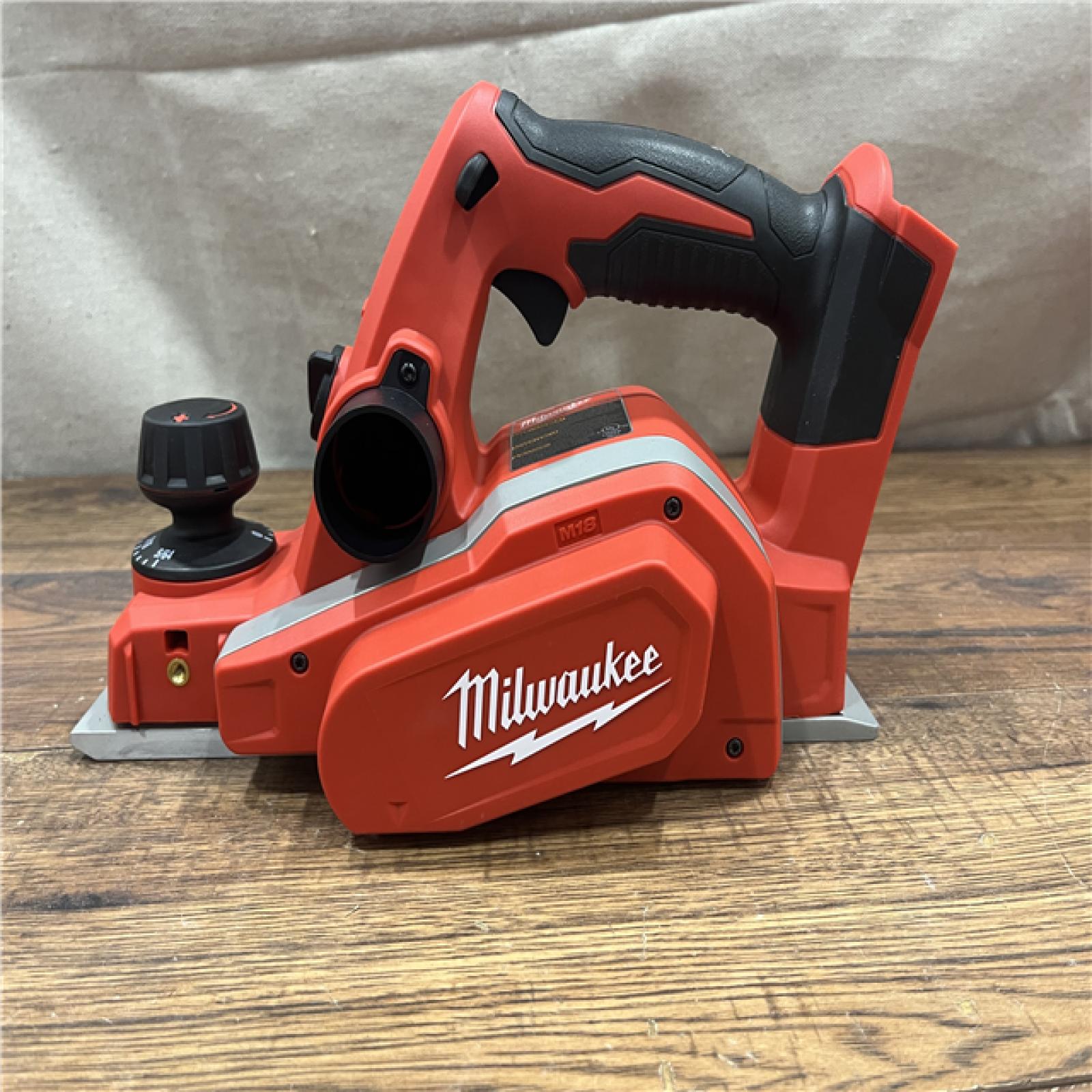 AS-IS Milwaukee M18 18-Volt Lithium-Ion Cordless 3-1/4 in. Planer (Tool-Only)